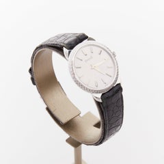 PIAGET Vintage Sunburst Possession silver face black scaled leather logo watch