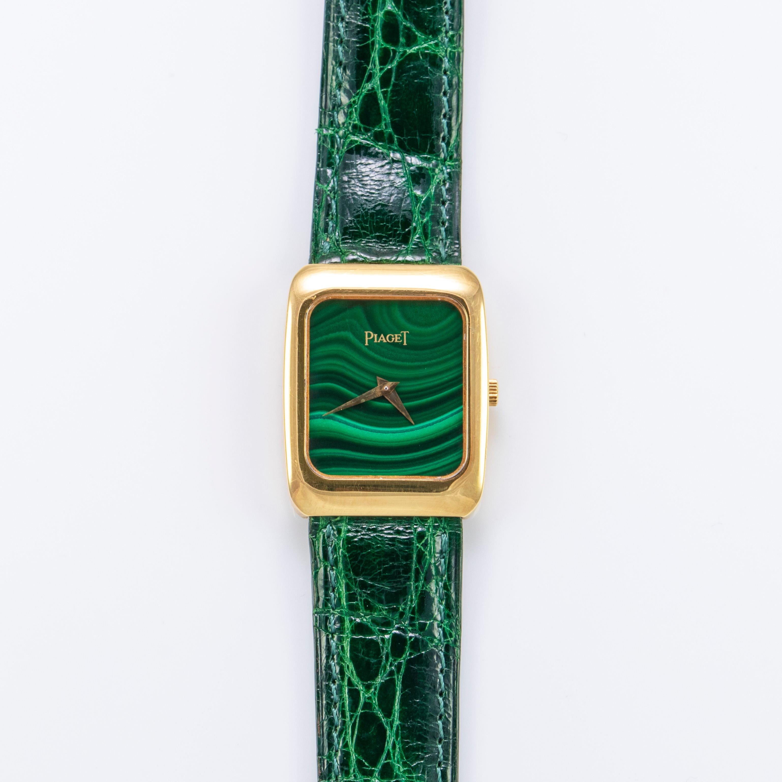 Piaget 18K Yellow Gold Watch with Malachite Stone Dial
Complicated Quartz Movement
Original Rhodonite Dial
Late 1970's Early 1980's Production
Solid 18K Yellow Gold Unpolished Tank Case Showing a Nice Patina Throughout
Case Shows some Light Wear and