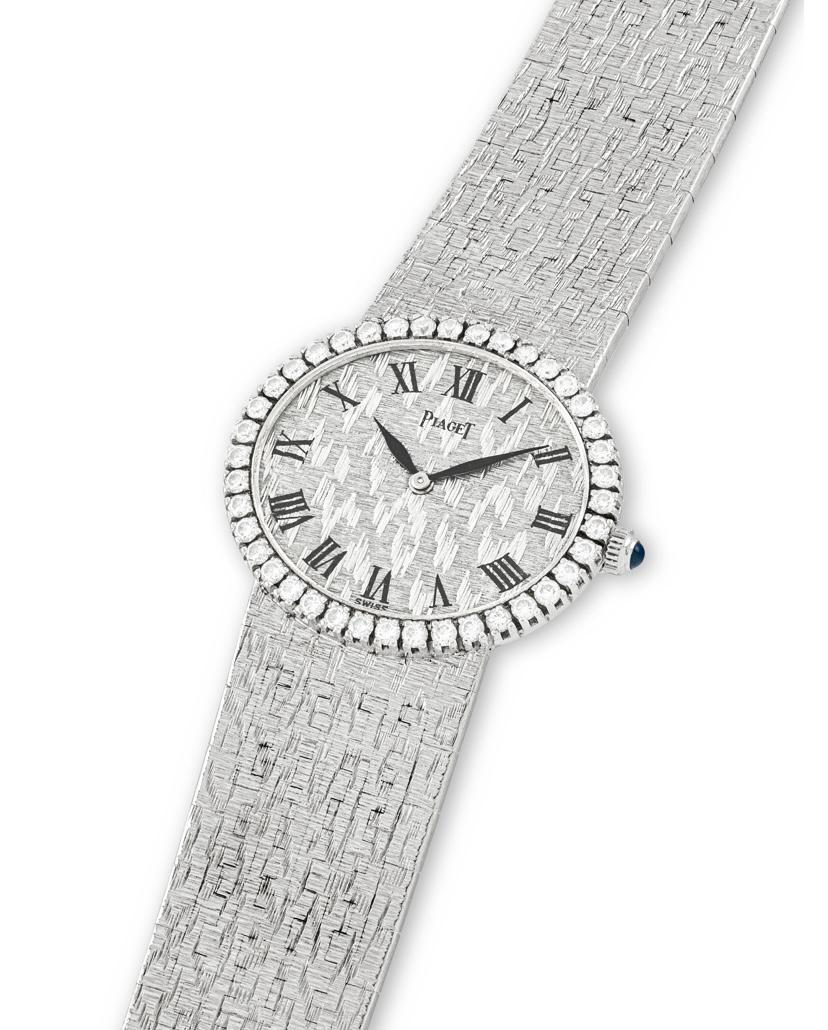 The oval case surrounded with brilliant-cut diamonds, manual movement, length approximately 155mm, case measuring approximately 27 x 24 mm, signed, numbered. According to Piaget, the watch was produced in 1976 and is fitted with 40 diamonds (0.82
