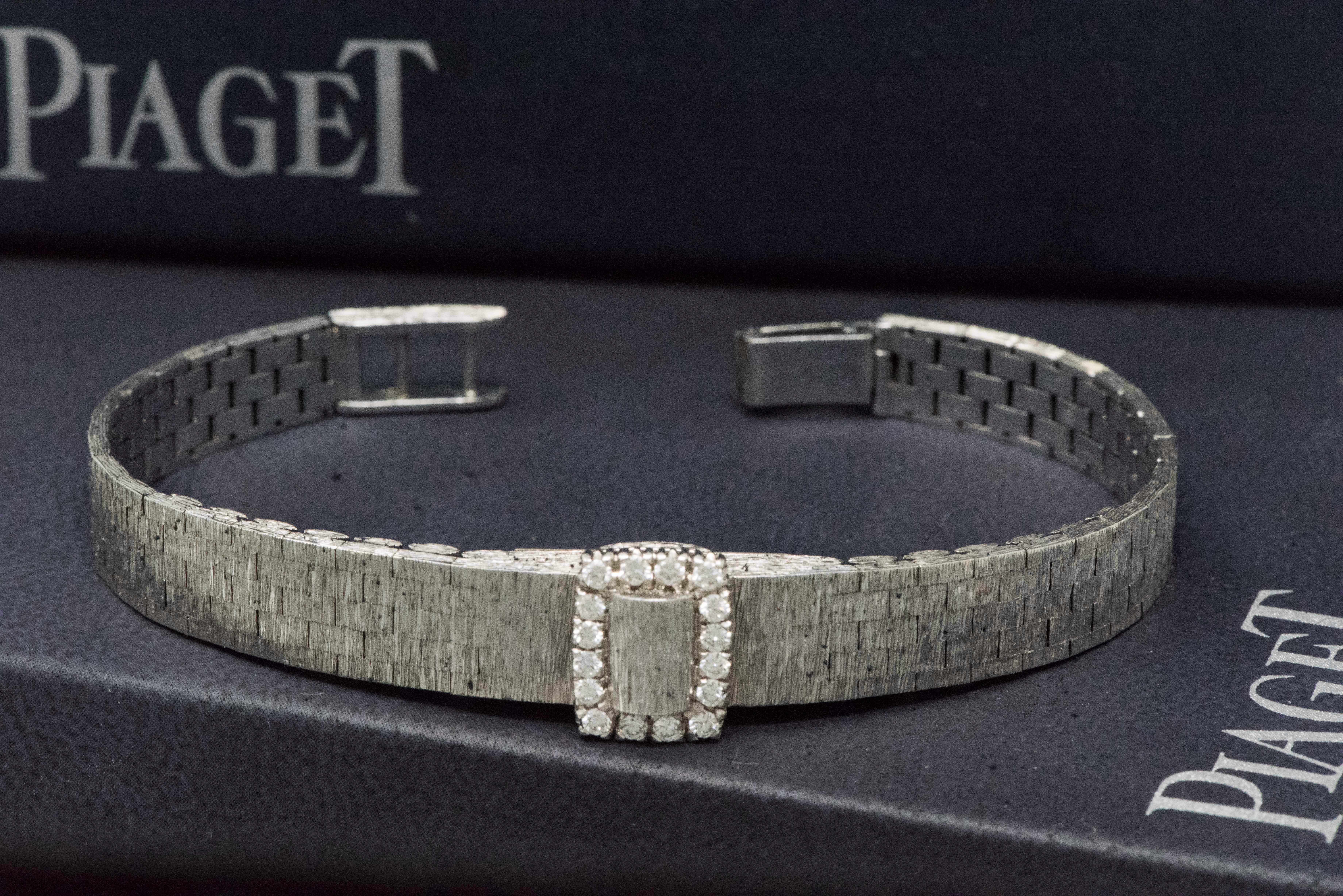 Rare Piaget Diamond Set Concealed 18kt White Gold Bracelet Wristwatch 
Circa 1960s

The present watch is a very rare 1960s Diamond Set 18kt white gold textured concealed Piaget bracelet wrist watch.
At this time, Piaget was experimenting with many