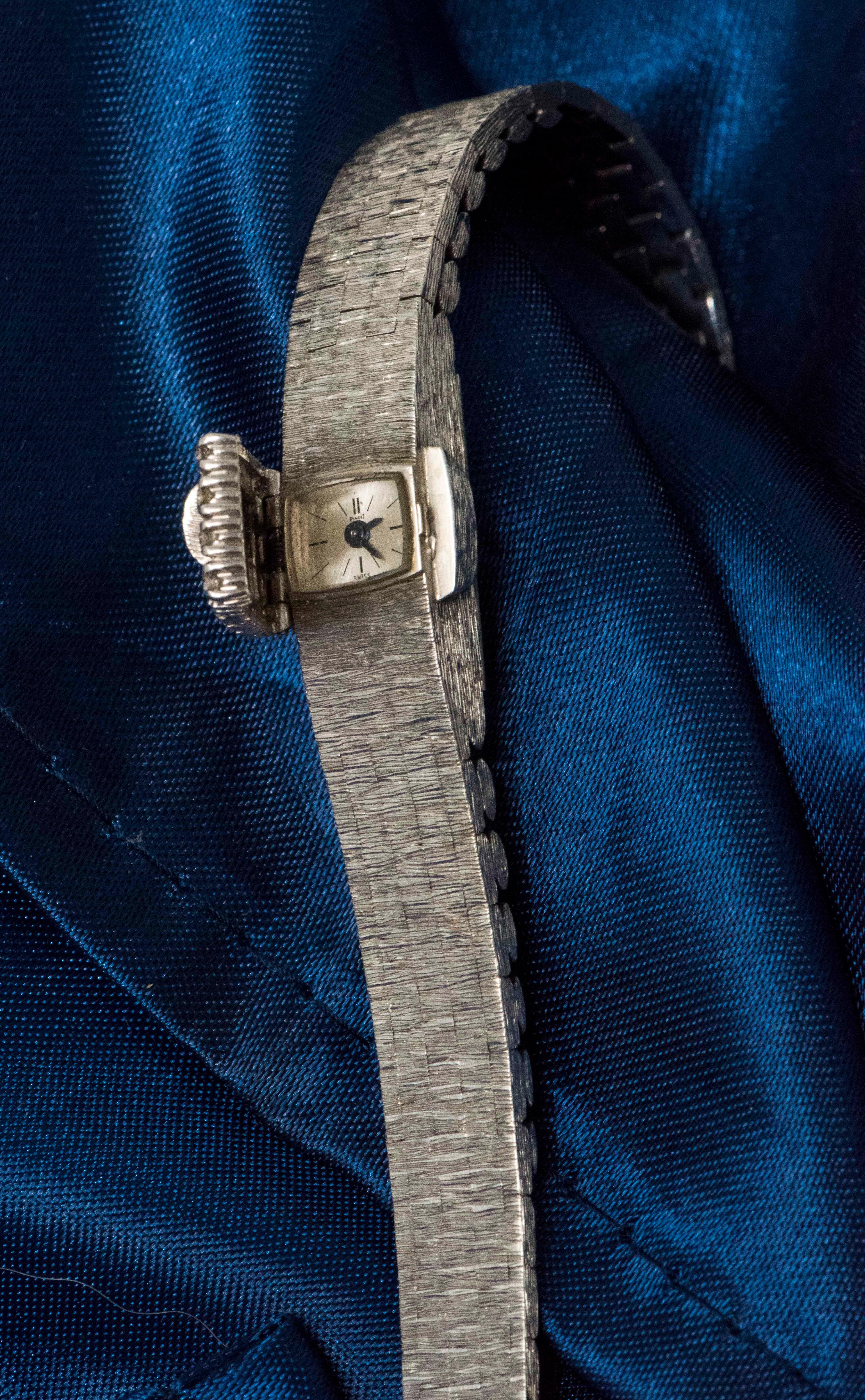 Round Cut Piaget White Gold Diamond Concealed Dial Bracelet Wristwatch, circa 1960s