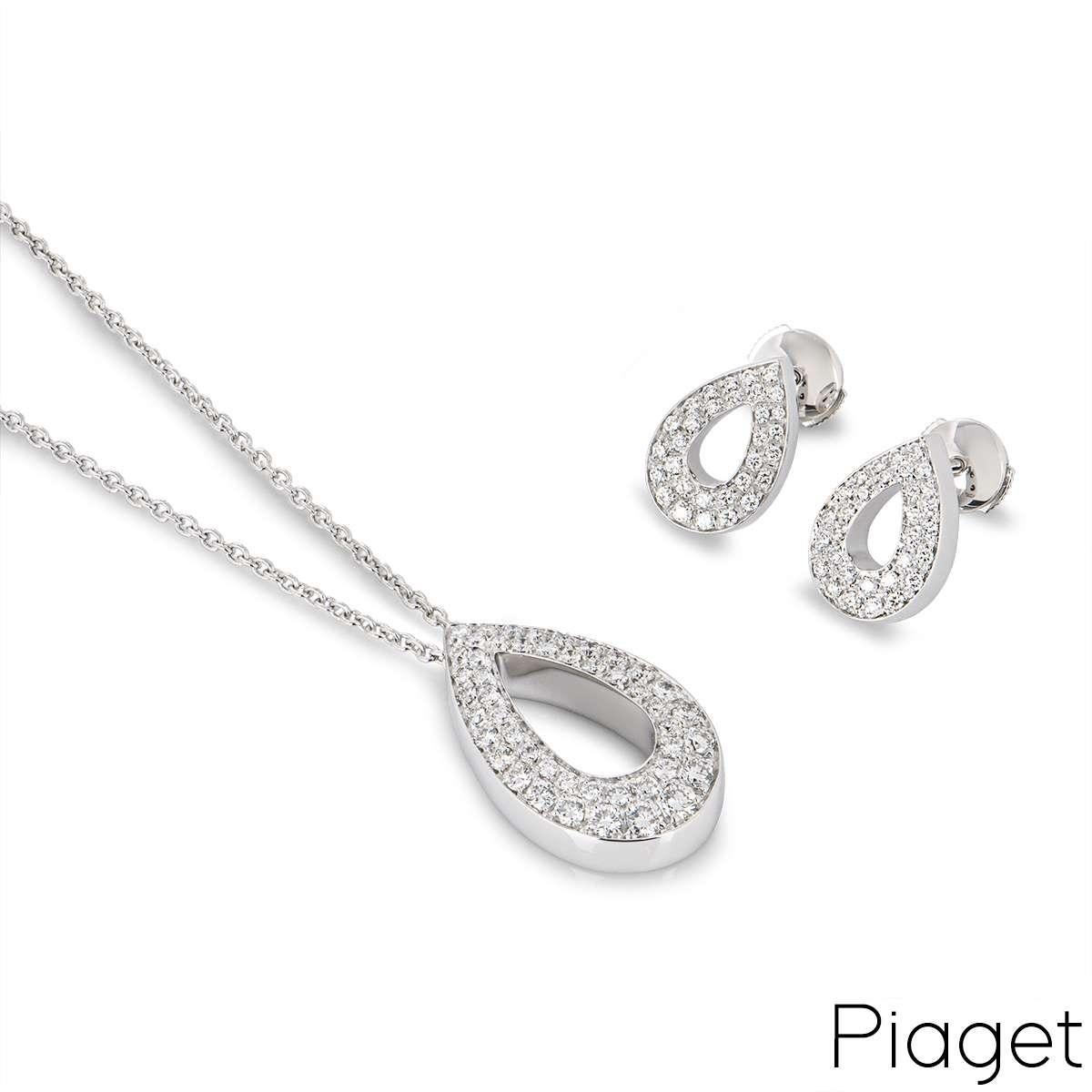A beautiful 18k white gold diamond pendant and earring suite by Piaget. The pendant is made up of an open work pear shaped motif and is set with 47 round brilliant cut diamonds totalling an approximate weight of 1.25ct. The pendant is 2.5cm in