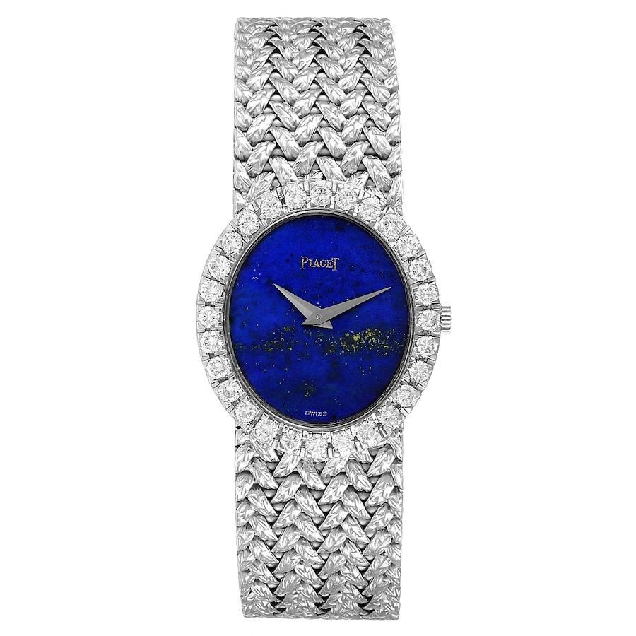 Piaget White Gold Lapis Lazuri Dial Diamond Vintage Cocktail Ladies Watch 9814. Manual winding movement. 18k white gold oval case 27.0 x 24.0 mm in diameter. Diamond bezel. Mineral glass crystal. Lapis lazuri dial with 18K white gold Dauphine hands.