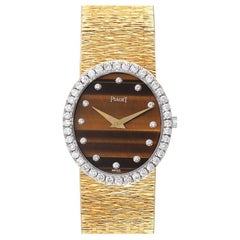 Piaget: Vintage Cocktail-Damenuhr aus Gelbgold mit Tigerauge 9826