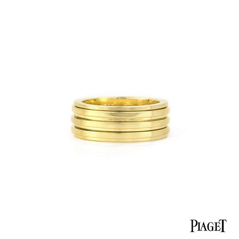 An 18k yellow gold Piaget Possession ring. The 8mm step edge design ring features 3 bands which move freely in a perpetual movement. The ring is a size EU 55/UK P/US 7.5 and has a gross weight of 14.07 grams.

The ring comes complete with a Piaget