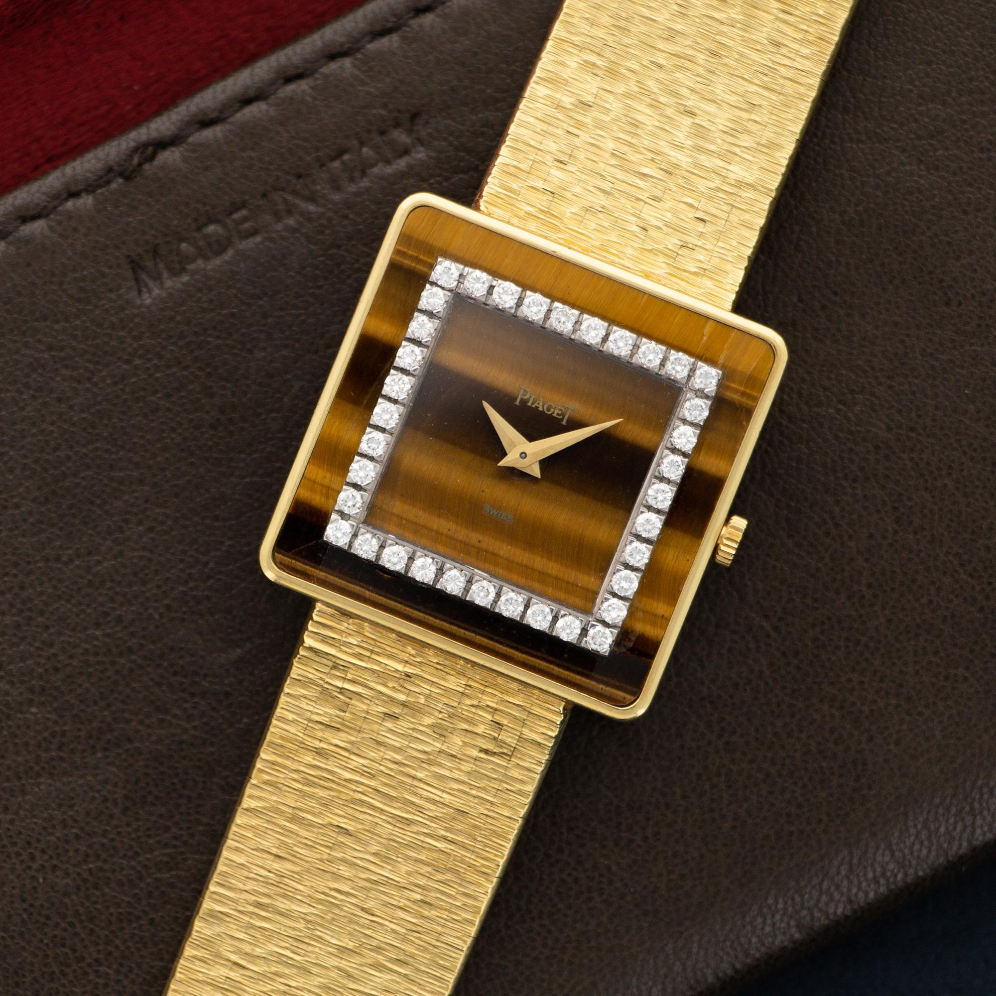 An 18k Yellow Gold Diamond & Tigers Eye Wristwatch By Piaget. Circa 1970's.

27mm Case Diameter.

Manual Wind Movement.