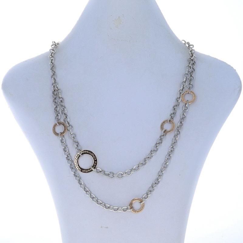 Retail Price: $1160

Brand: Pianegonda
Collection: Annulus
Design: Multi-Strand

Metal Content: Sterling Silver & 18k Yellow Gold

Style: Multi-Strand Station Chain
Chain Style: Flat Rolo
Necklace Style: Chain Station
Fastening Type: Lobster