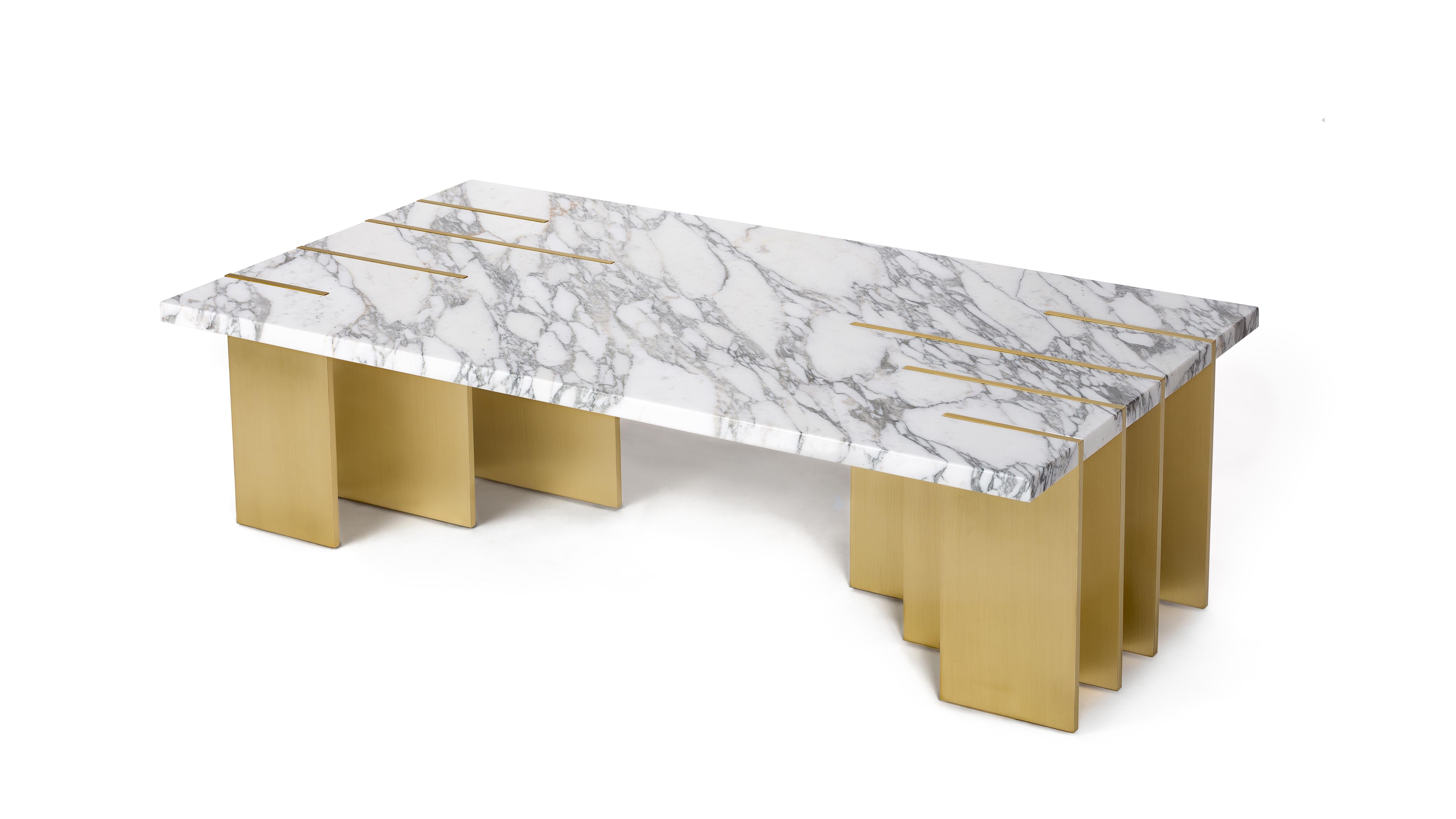 Pianist Calacatta Marble Coffee Table by InsidherLand
Dimensions: D 75 x W 130 x H 38 cm.
Materials: Calacatta marble, brushed brass.
115 kg.
Other marbles are available.

The Pianist coffee table, doesn't represent the piano but the hands of the