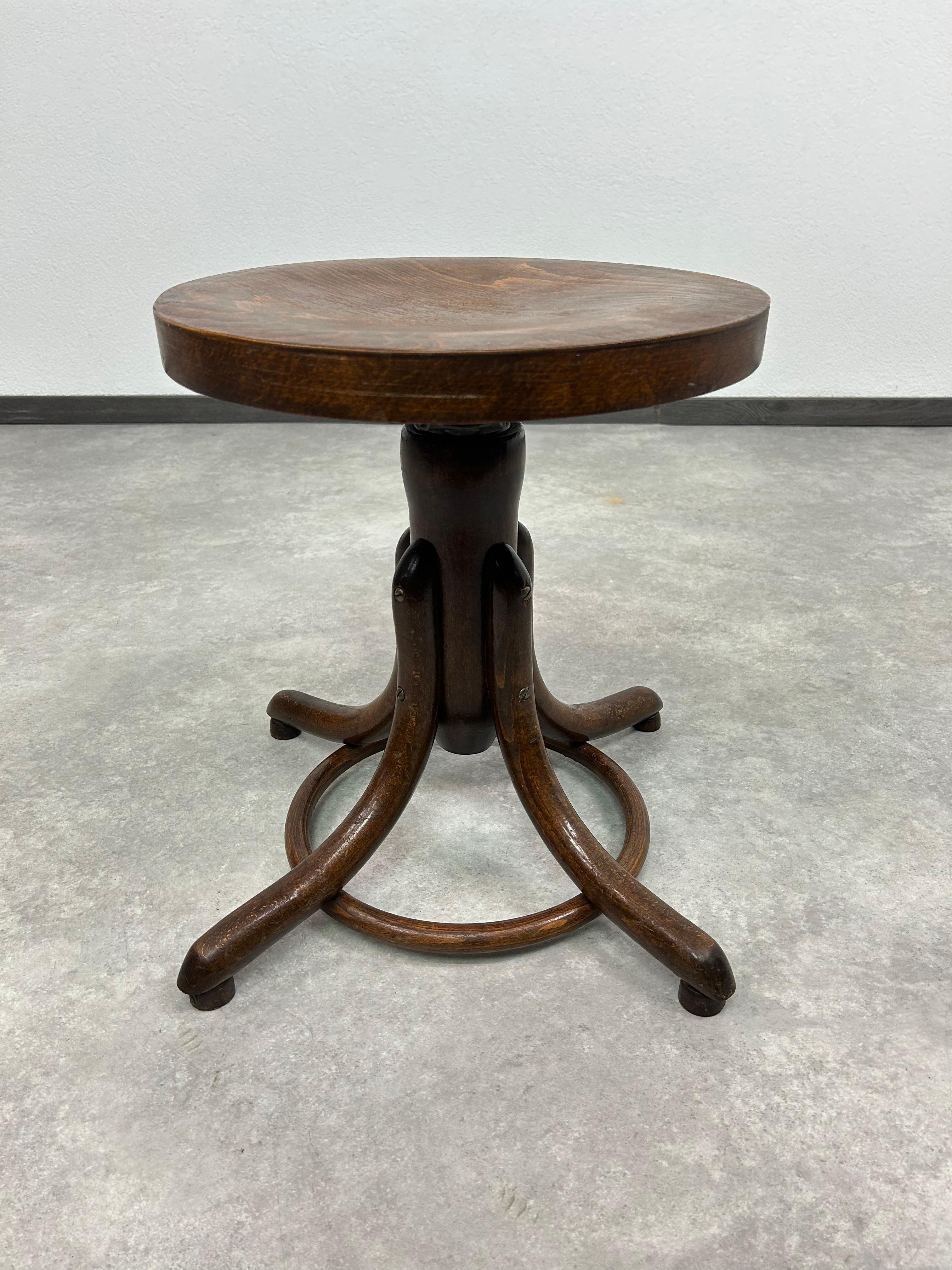 Adjustable piano chair by Tatra Nábytok Martin in very nice oriignal condition with signs of use.