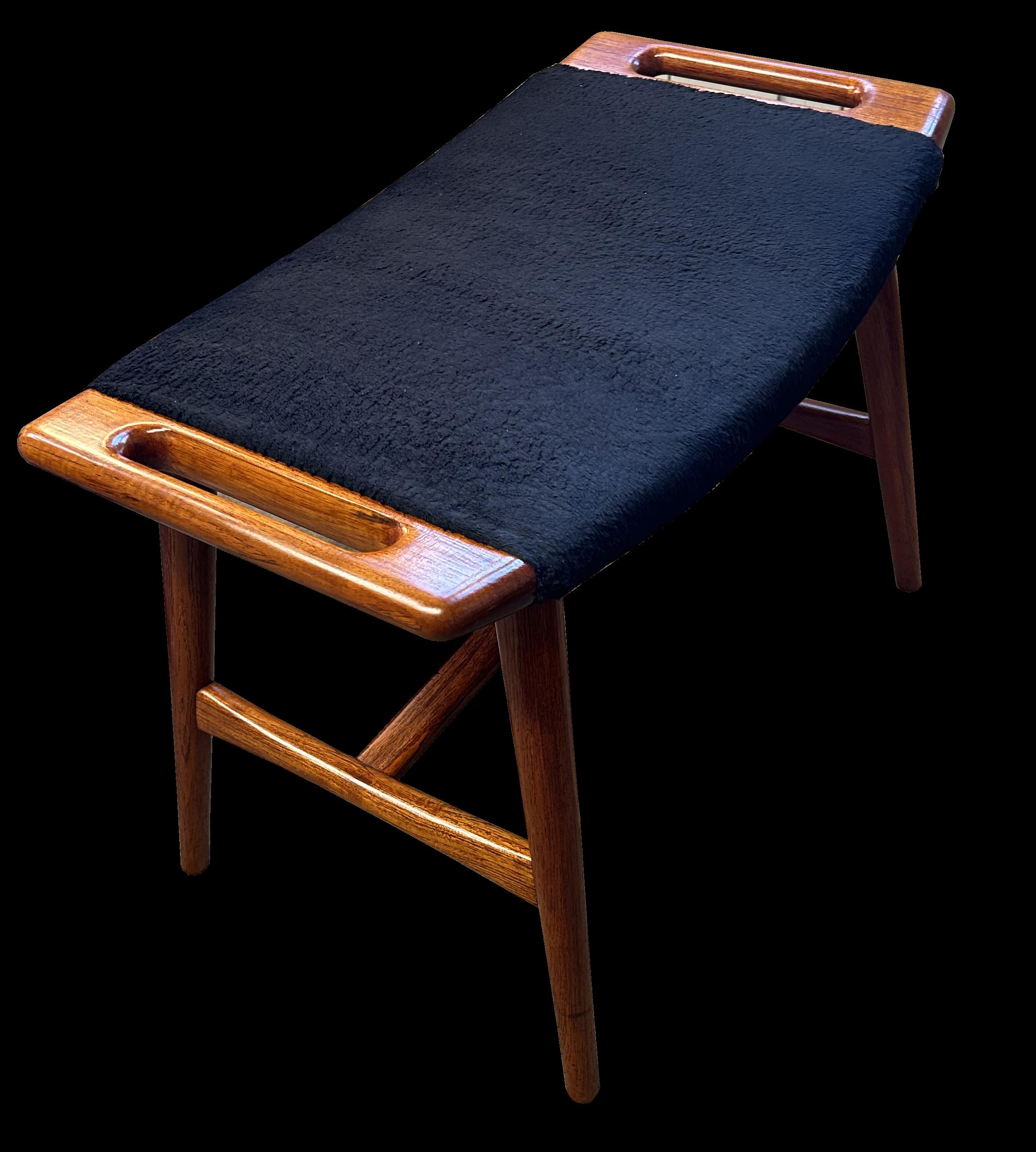 This beautiful Piano stool model AP30 by Hans Wegner for AP Stolen in Copenhagen has been reupholstered in Pierre Frey Alpaca fur fabric, and the teak parts are in superb condition.