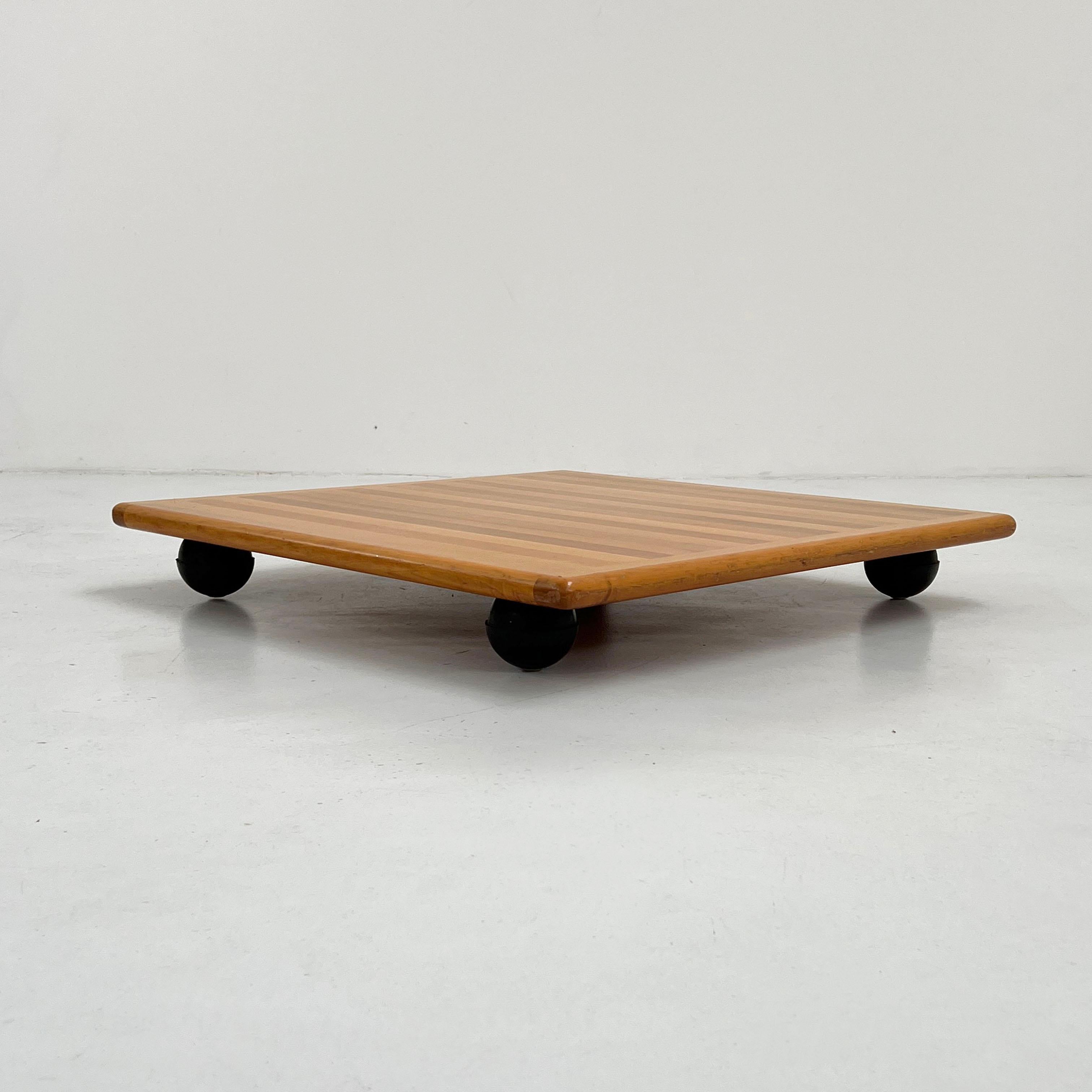 Designer - Mario Bellini
Producer - Cassina
Model - Pianura Coffee Table
Design Period - Seventies
Measurements - Width 80 cm x Depth 80 cm x Height 11 cm 
Materials - Wood
Color - Black, Brown
Comments - Light wear consistent with age and use.