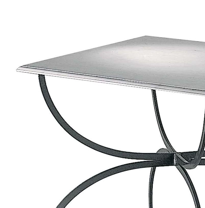 A striking addition to a patio, poolside, or terrace, this table is part of the Piazza Collection and evokes the understated elegance of Tuscan towns' piazzas. Inspired by traditional styles interpreted in a modern fashion, this table exudes