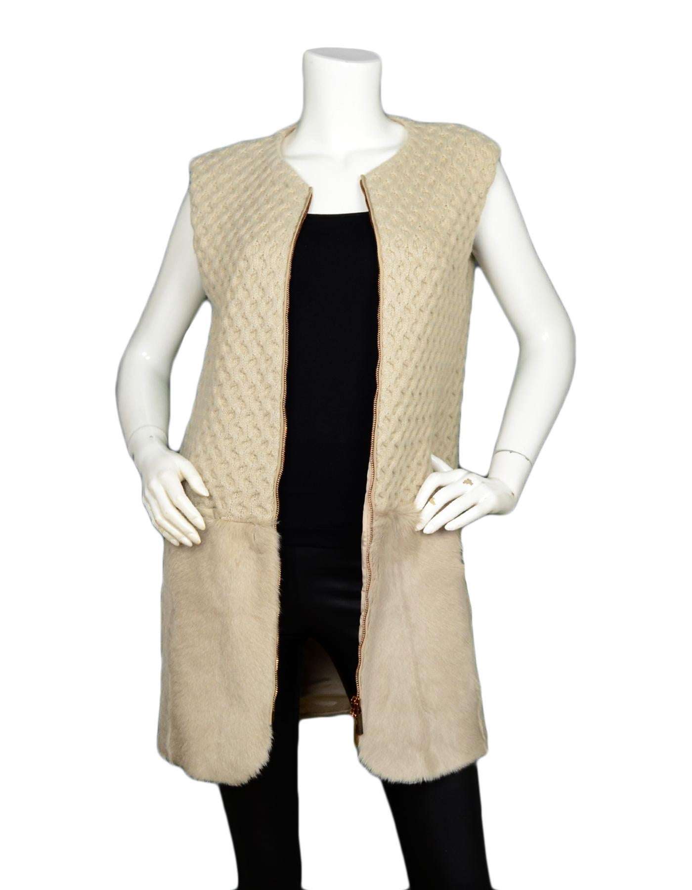 Piazza Sempione Beige Wool Fur Knit Zip Up Vest w/ Fur Trim sz IT 40

Made In: Italy
Year of Production: 
Color:
Materials: 75% Wool, 15% Silk, 10% Cashmere
Lining: 93% Cupro, 7% Elastane 
Opening/Closure: Front zip-up
Overall Condition: Excellent