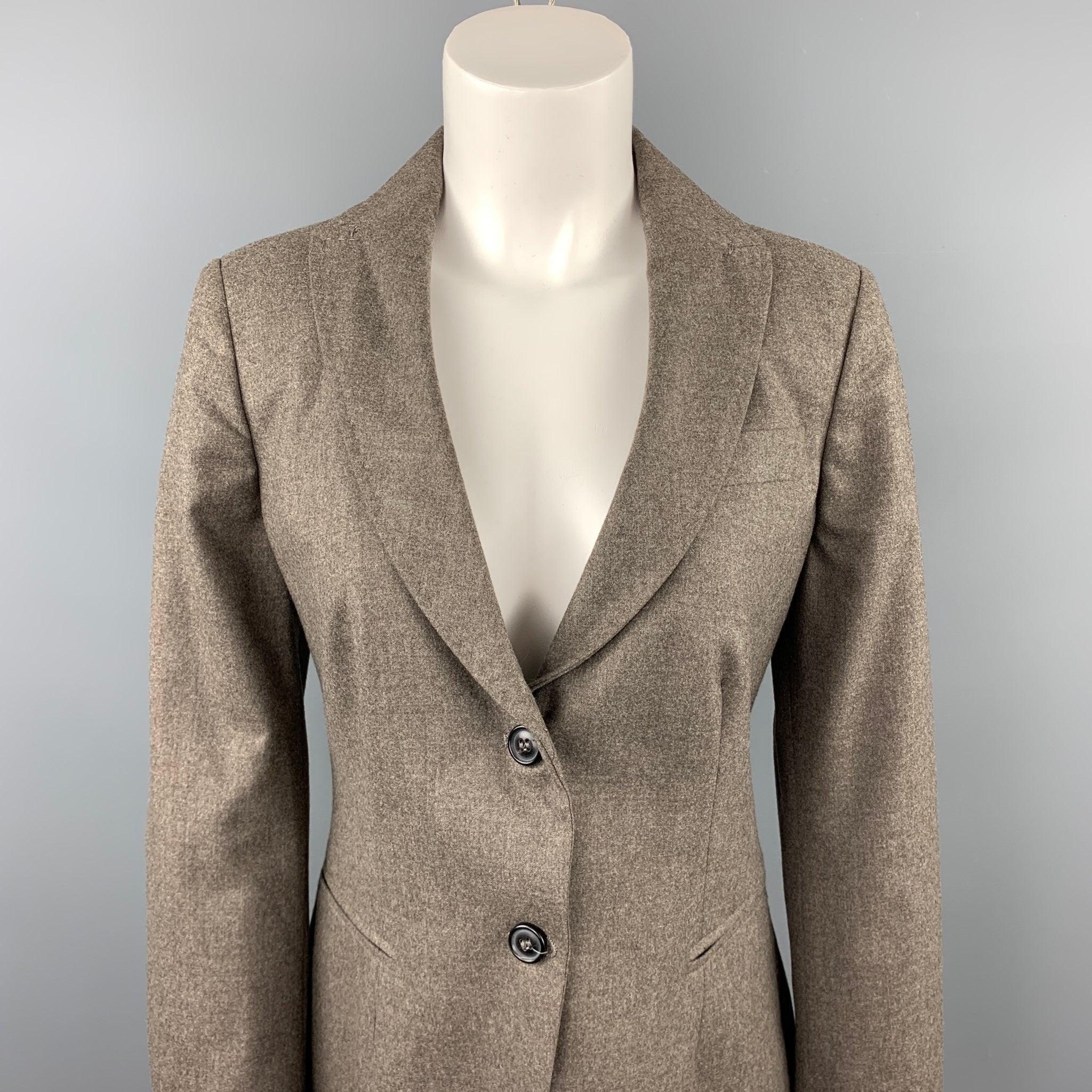 PIAZZA SEMPIONE blazer comes in a taupe wool blend featuring a notch lapel style, slit pockets, and a buttoned closure. Made in Italy.Very Good
Pre-Owned Condition. 

Marked:   IT 44 

Measurements: 
 
Shoulder: 16 inches 
Bust: 34 inches 
Sleeve: