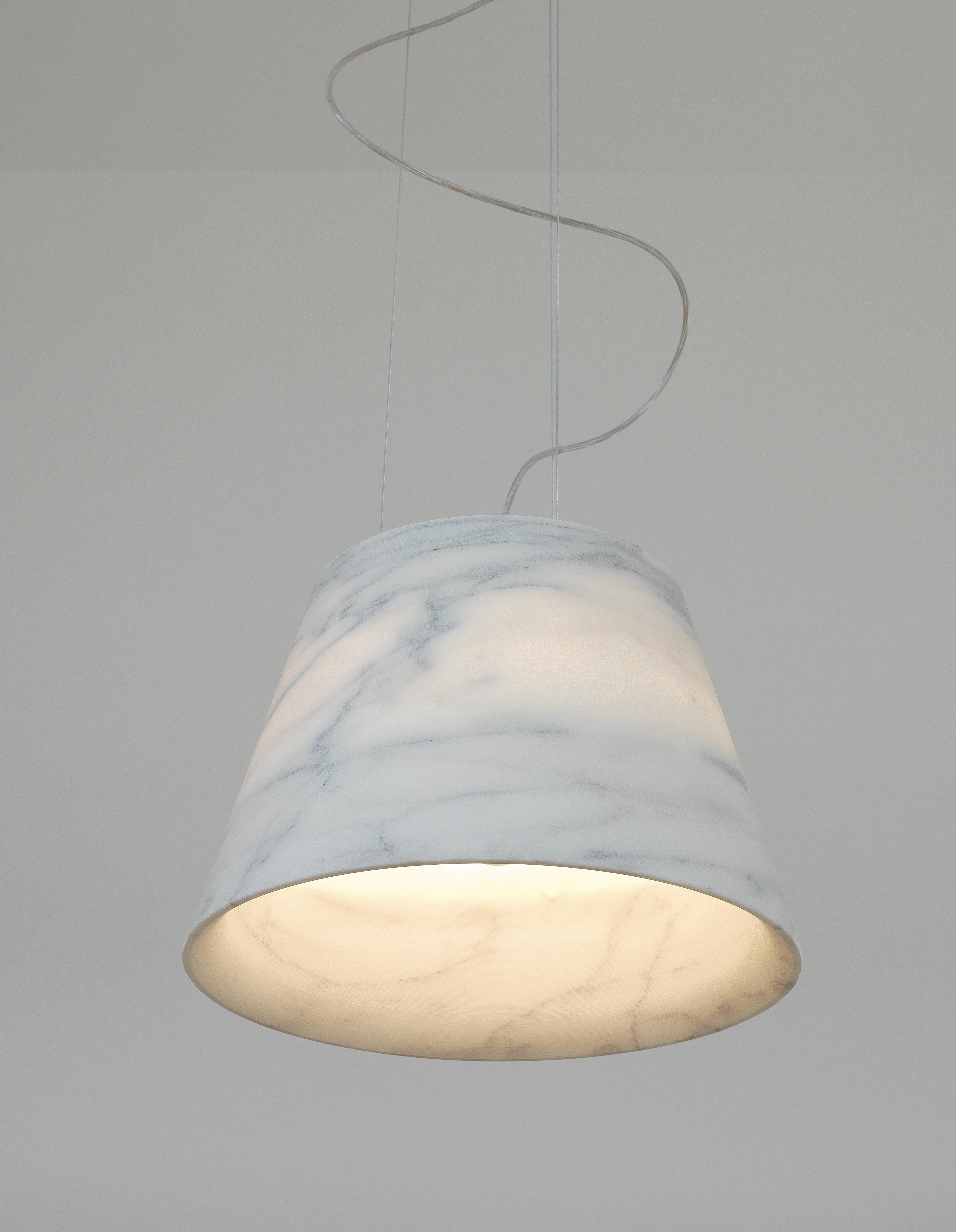Designed by Michele De Lucchi e Philippe Nigro, Apuleio is a unique and modern pendant carved from a Bianco Carrara marble block.
Apuleio comes in every dimensions, stones and finishes.