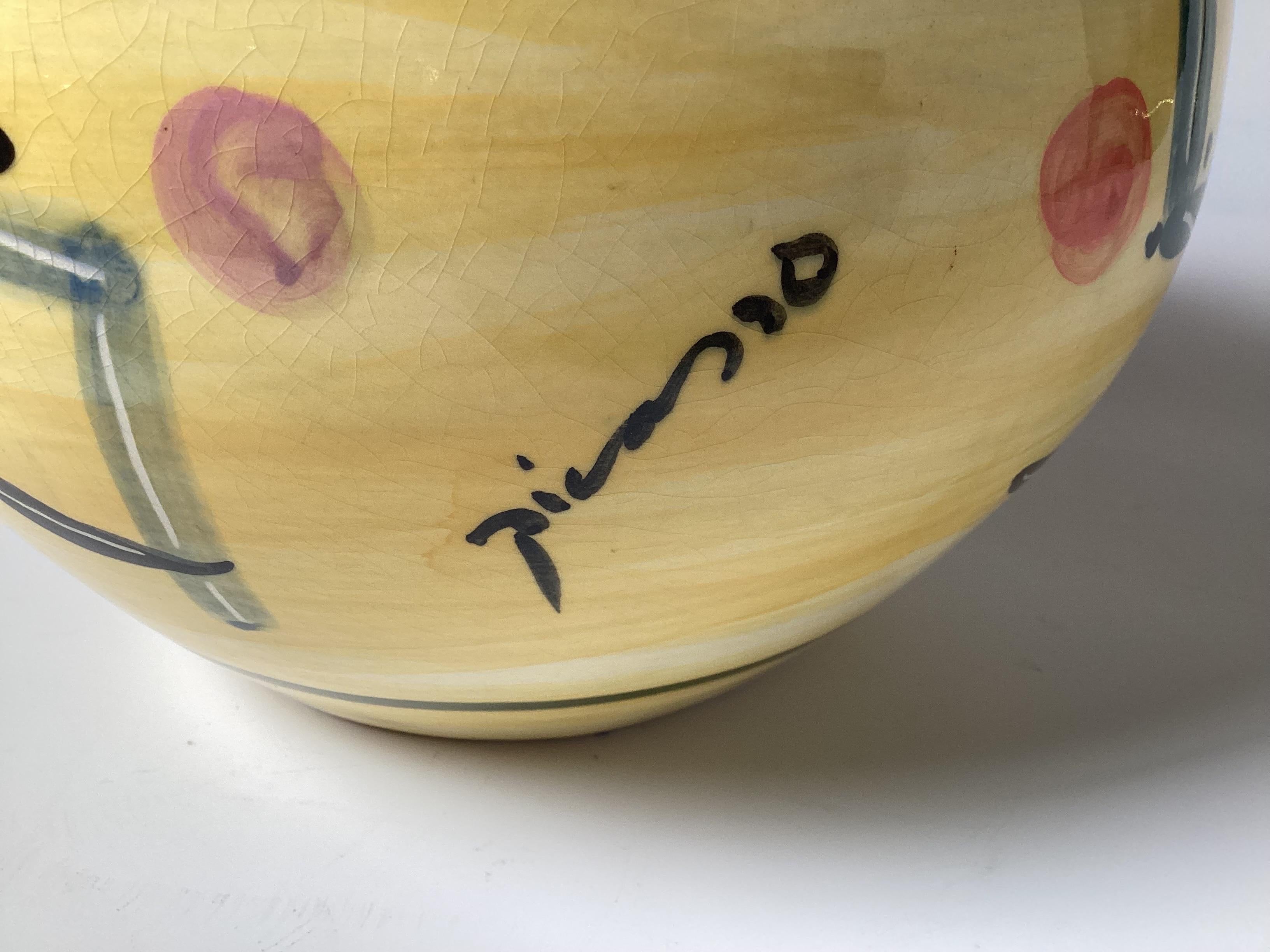 A Vibrant hand painted ceramic vase signed Picasso by Padilla Foundry.  The vase is a re-issue of the famous 