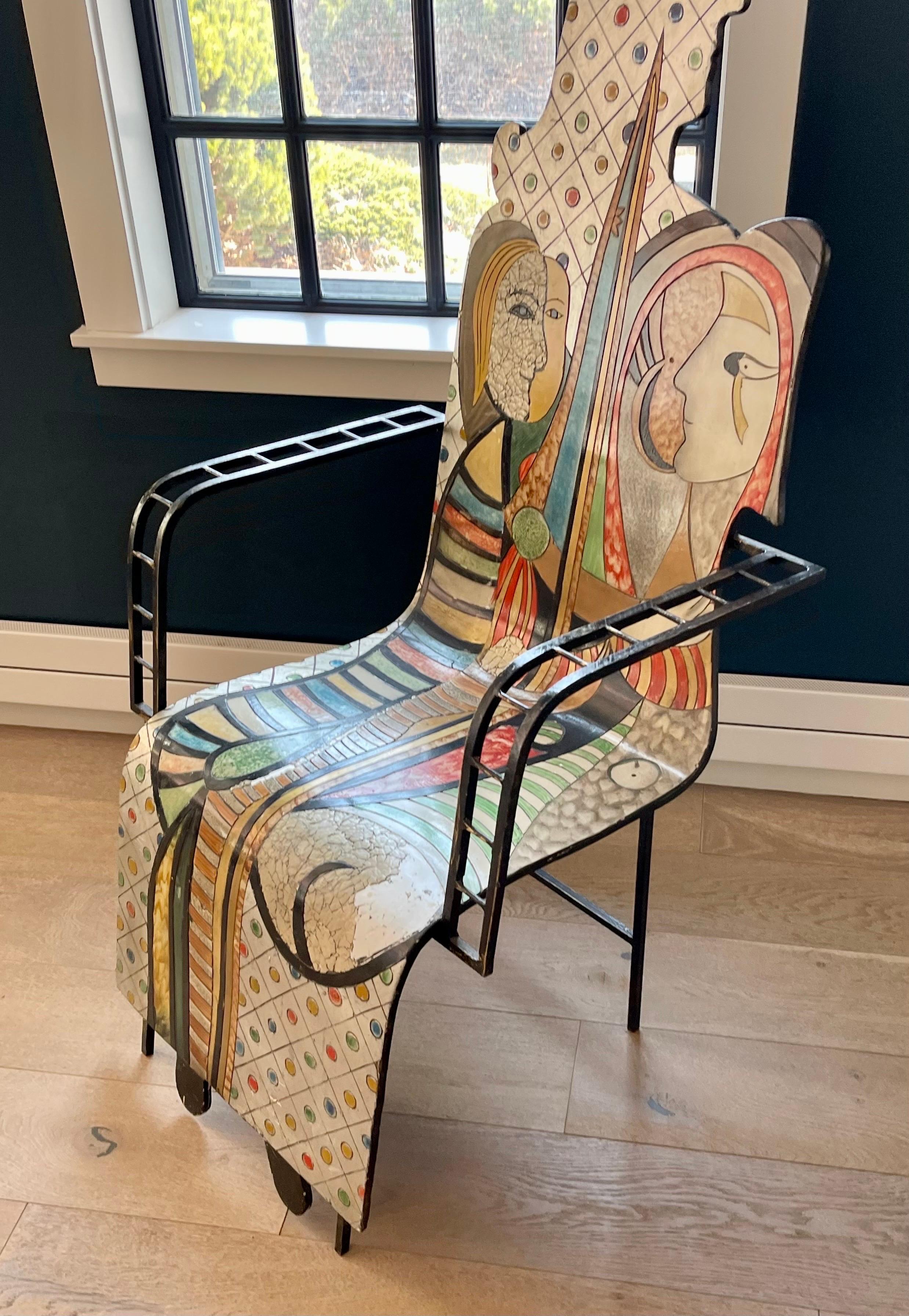 A rare pair of Folk Art armchairs. The single bent plywood seat and back extend to the floor and rests on a sturdy hand wrought frame. Both depict Picasso inspired colorful Figural images in mixed media. There are large in scale and they can command