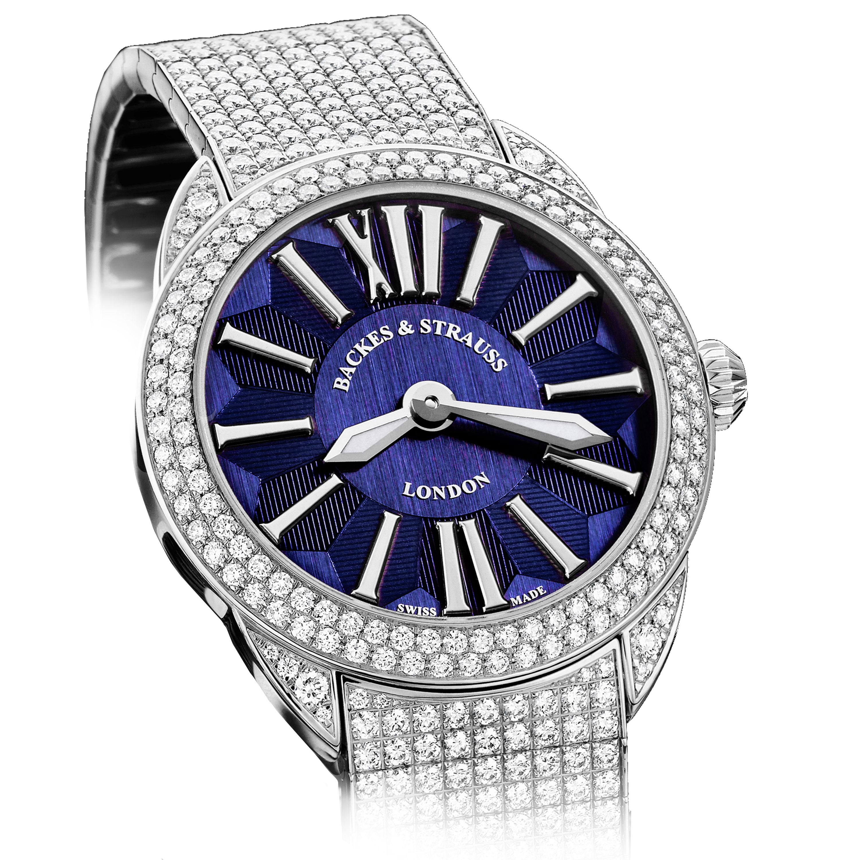 The Piccadilly Renaissance 40 is a luxury diamond watch for men and women crafted in 18kt White gold, featuring the blue dial and white gold roman numerals, mechanical movement.  The case, bracelet, buckle and crown are set with white Ideal Cut