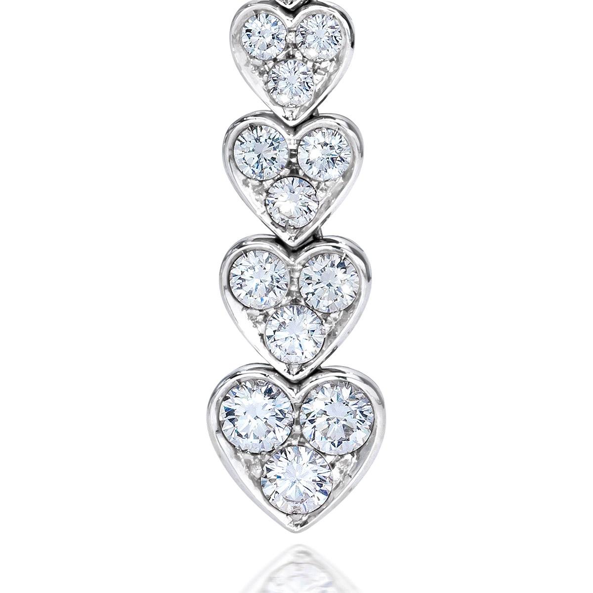 These gorgeous graduating diamond heart drops are handcrafted by the renowned Italian designer PIcchiotti. Set in 18kt white gold, these 3