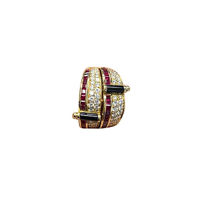 Crafted by the famed Italian designer Guiseppe Picchiotti, this ring is a perfect example of his meticulous work. Set in 18 karat yellow gold this ring features two rows of square cut rubies along with two sections of pave diamonds. Two bars of