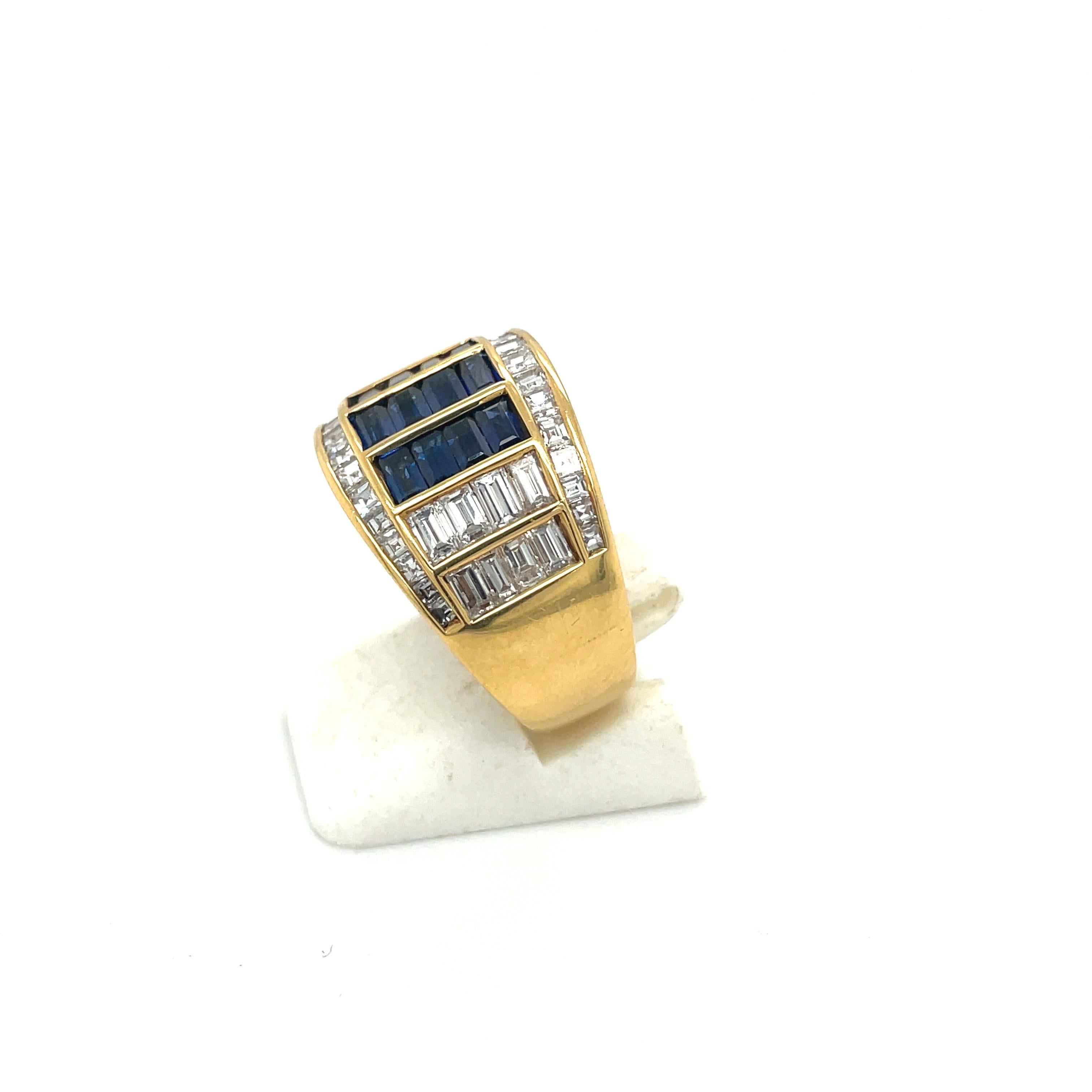 Designed by master craftsman Giuseppe Picchiotti . Cellini NYC presents this 18 karat yellow gold band ring beautifully set with baguette and square cut diamonds ,and baguette blue sapphires. The ring measures 13.5mm at the widest and tapers down to