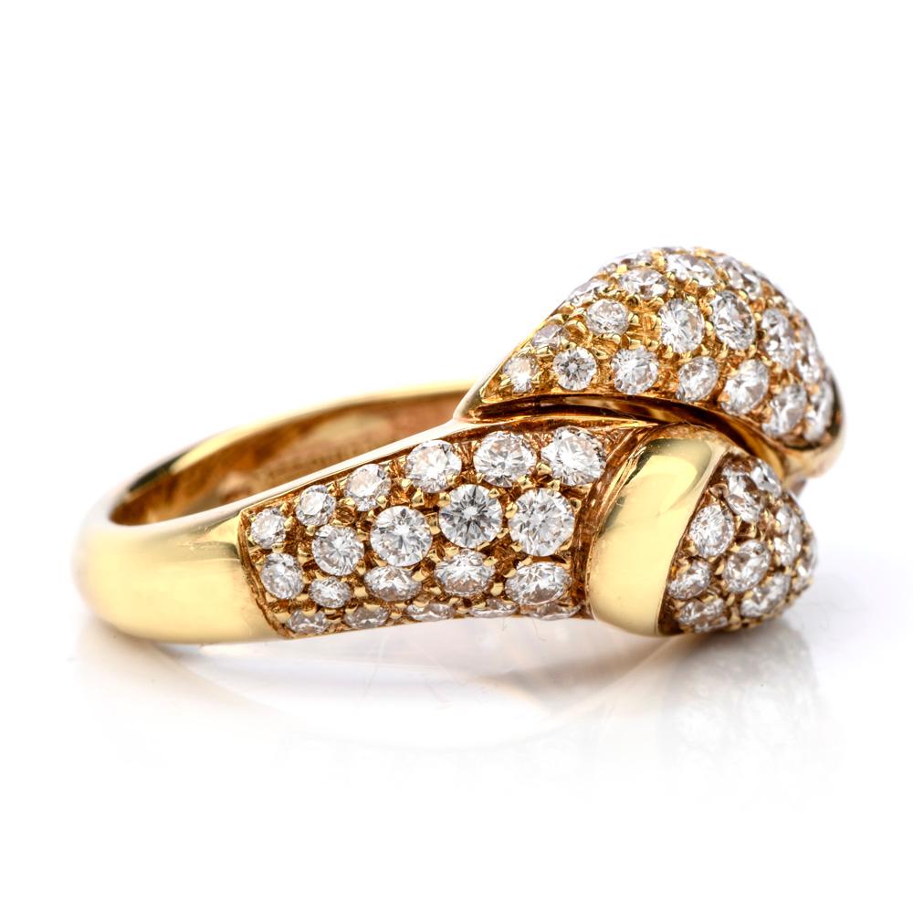 Place some sparkle on your hands with this striking Designer Picchiotti Vintage by pass vinatge Diamond 18K Gold Cluster.  This

High quality made  ring is crafted in 18 karat yellow gold and is a sizable 6.  It showcases Double snake head

gleaming