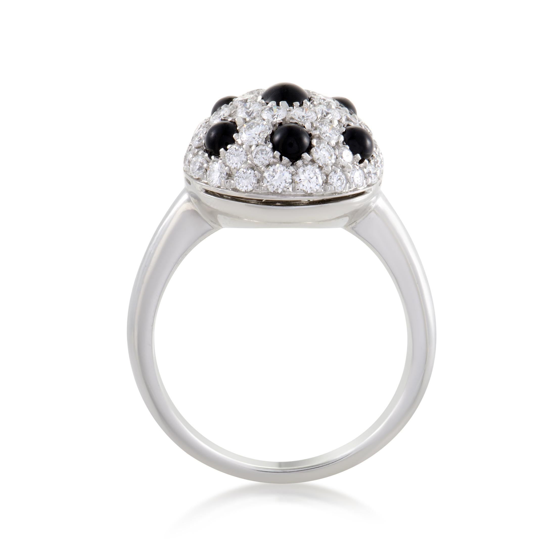 Resplendent and mesmerizing, the astonishing arrangement of diamonds weighing in total 1.13 carats is contrasted by the striking onyx stones upon the 18K white gold body of this lavish ring from Picchiotti for a dazzling effect.<br />Ring Top