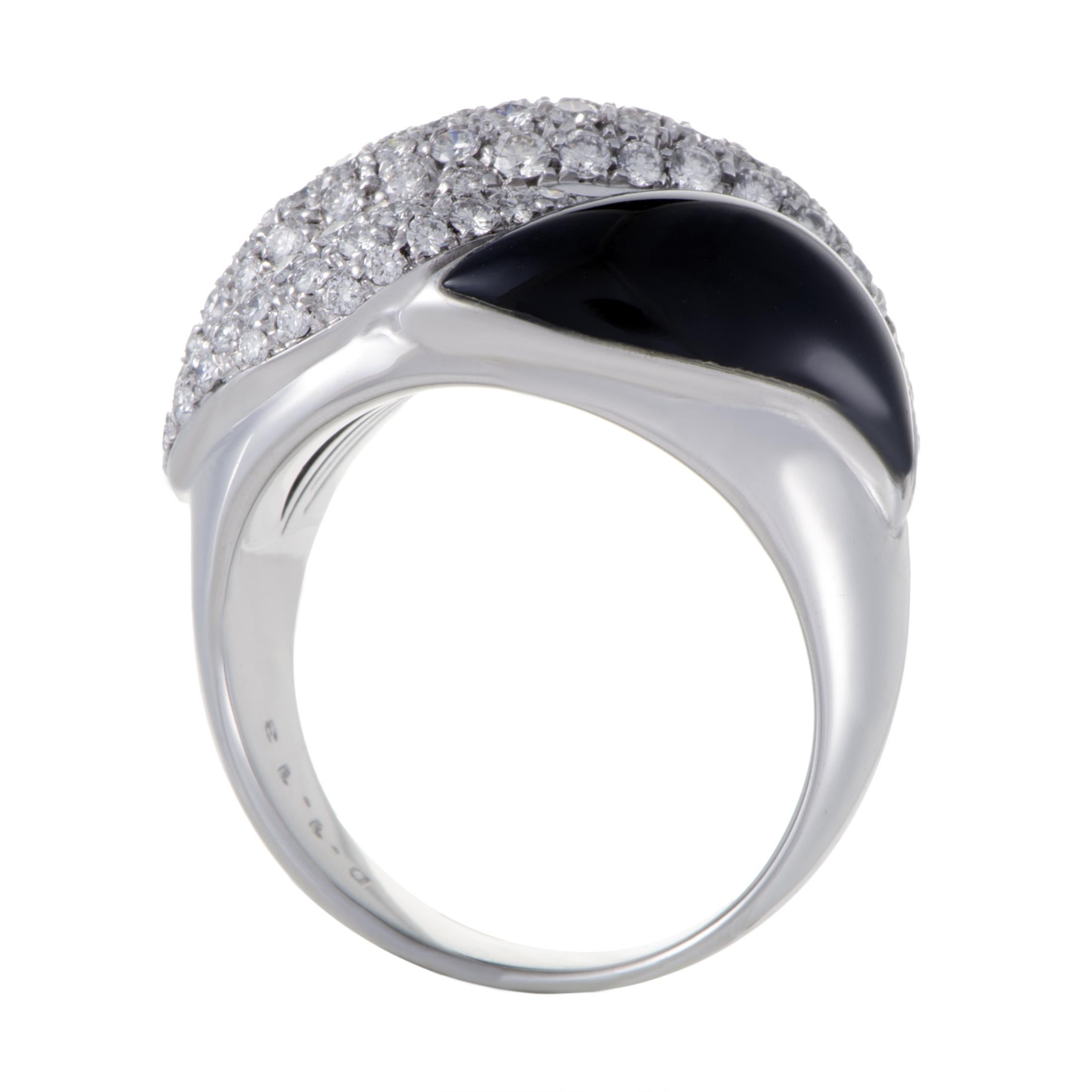 A staggering and attractively striking contrast is created by combining resplendent diamonds weighing in total 1.13 carats with captivating onyx stones in this majestic Picchiotti ring made of 18K white gold that boasts a magnificently graceful