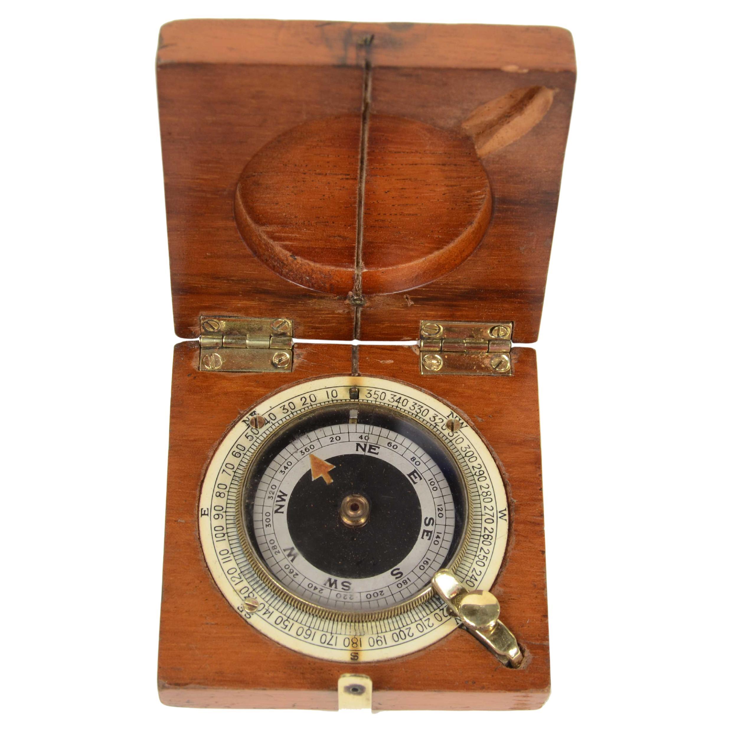 Small mahogany and brass compass in use by British aviation officers 1915