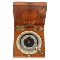 Small mahogany and brass compass in use by British aviation officers 1915