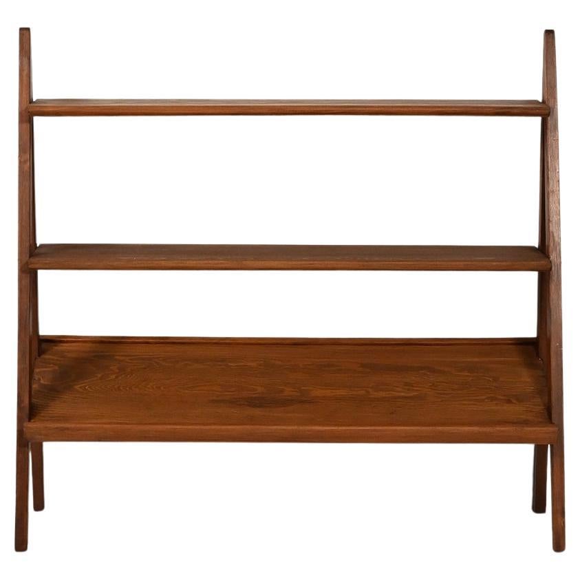 Small 1950s bookcase with magazine rack For Sale