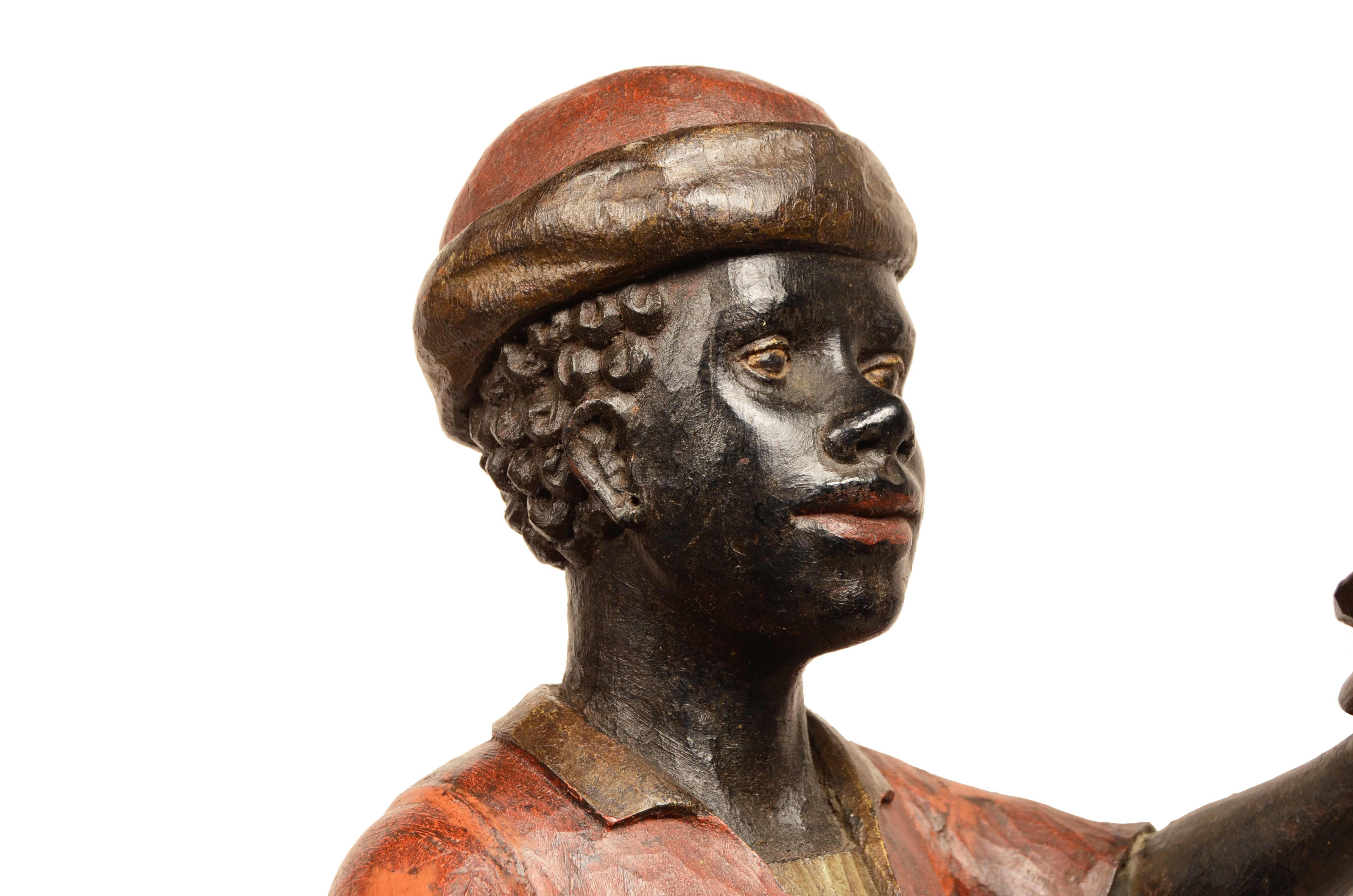 Pequeño mascarón de proa de madera tallada que representa al joven Moretto Venecia finales del siglo XIX en venta 13