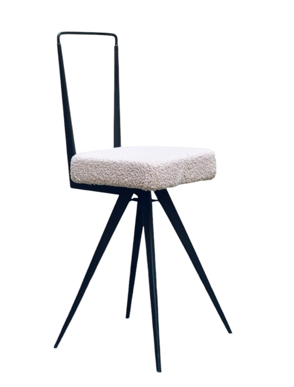 Small Chair with black painted tubular metal frame, seat with pale pink boucle' padding and upholstery. Slight Signs of Use.