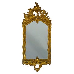Piccola specchiera in legno intagliato, scolpito e dorato, XVIII secolo