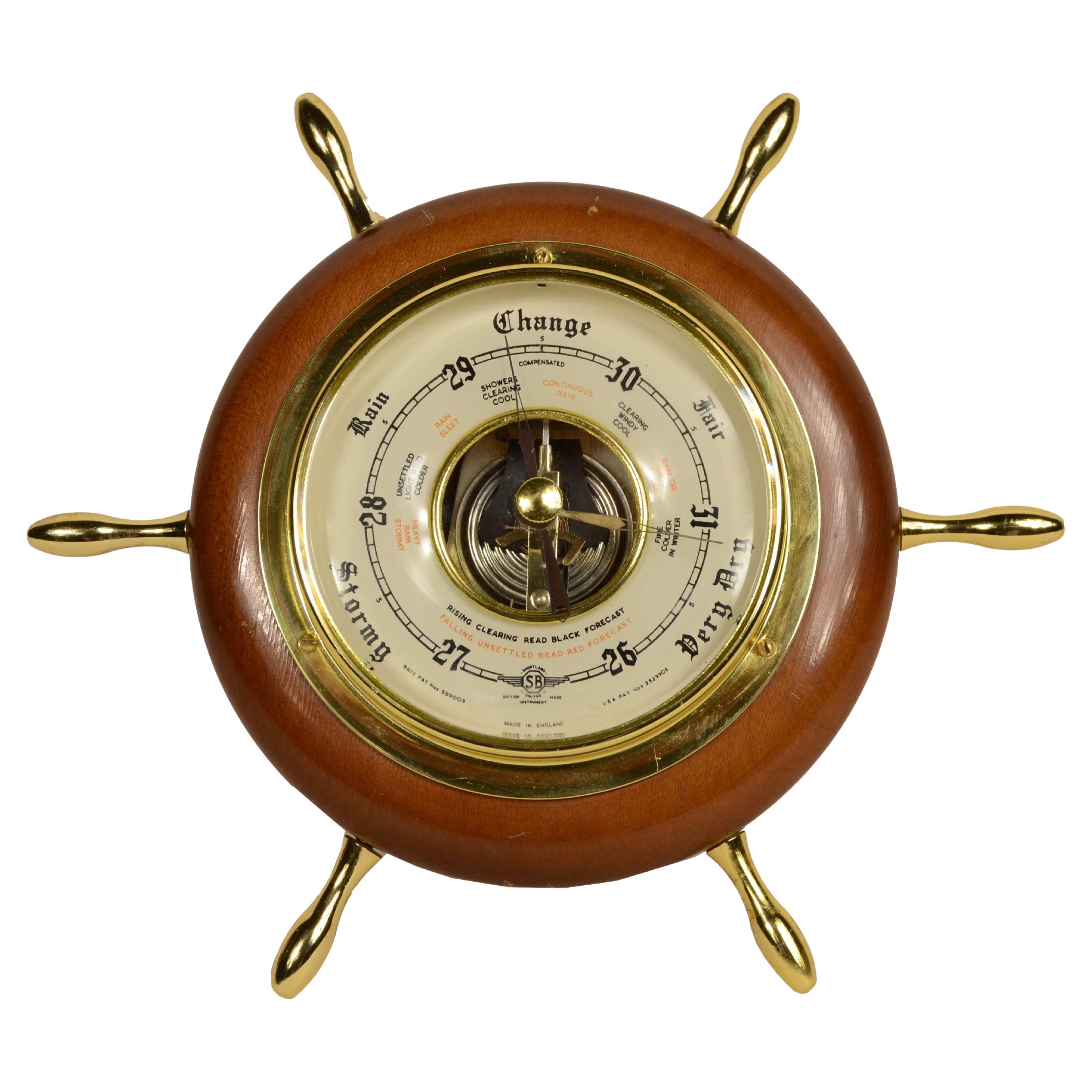 Small wooden wall barometer in the shape of a six-ankle rudder 1950s