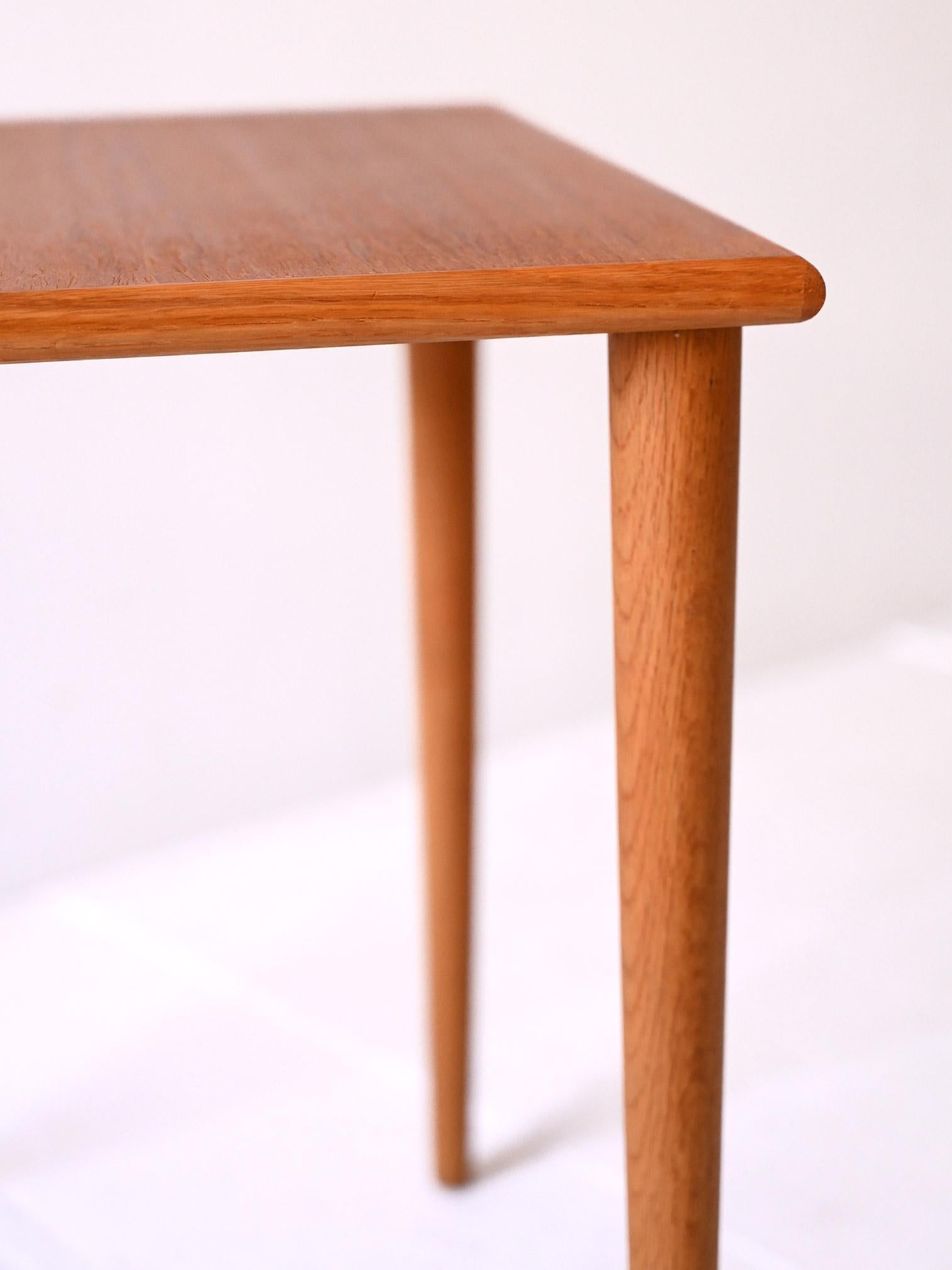 Teak Small Scandinavian 1950s coffee table with turned legs For Sale