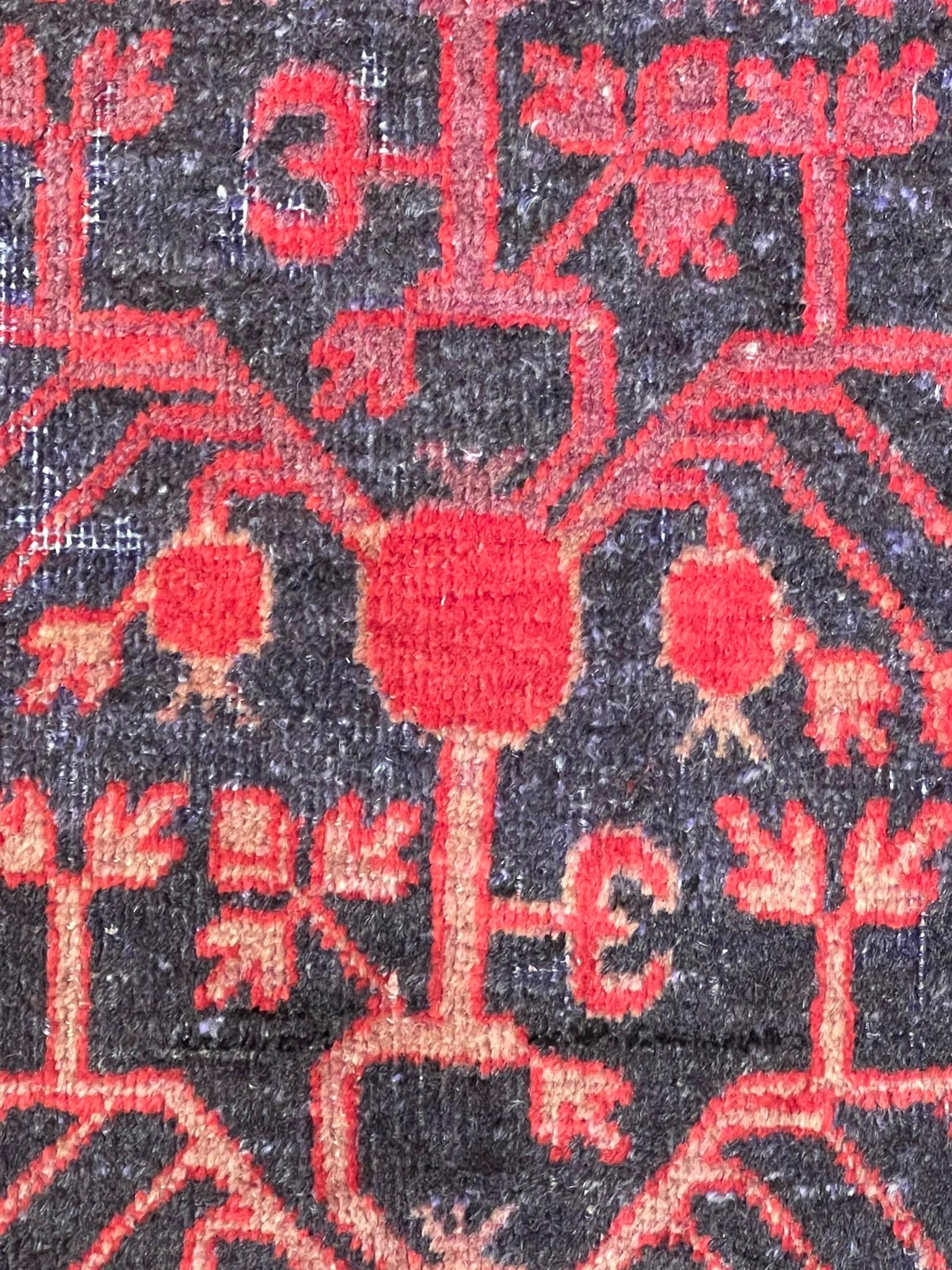 Hand-Knotted Small Yarkand rug decorated with pomegranate tones of cochineal red and gray For Sale