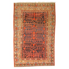 Small Yarkand rug decorated with pomegranate tones of cochineal red and gray