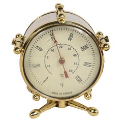 Small brass thermometer with dual Celsius and Fahrenheit scales France 1930s
