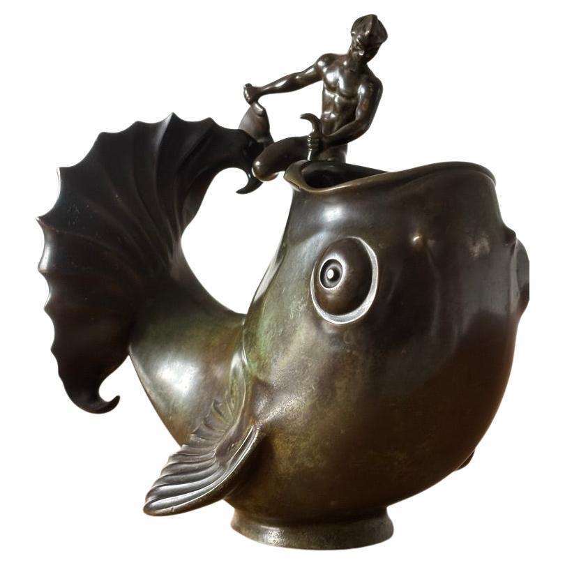 Pichet en bronze de Just Andersen chasseur et poisson in vendita