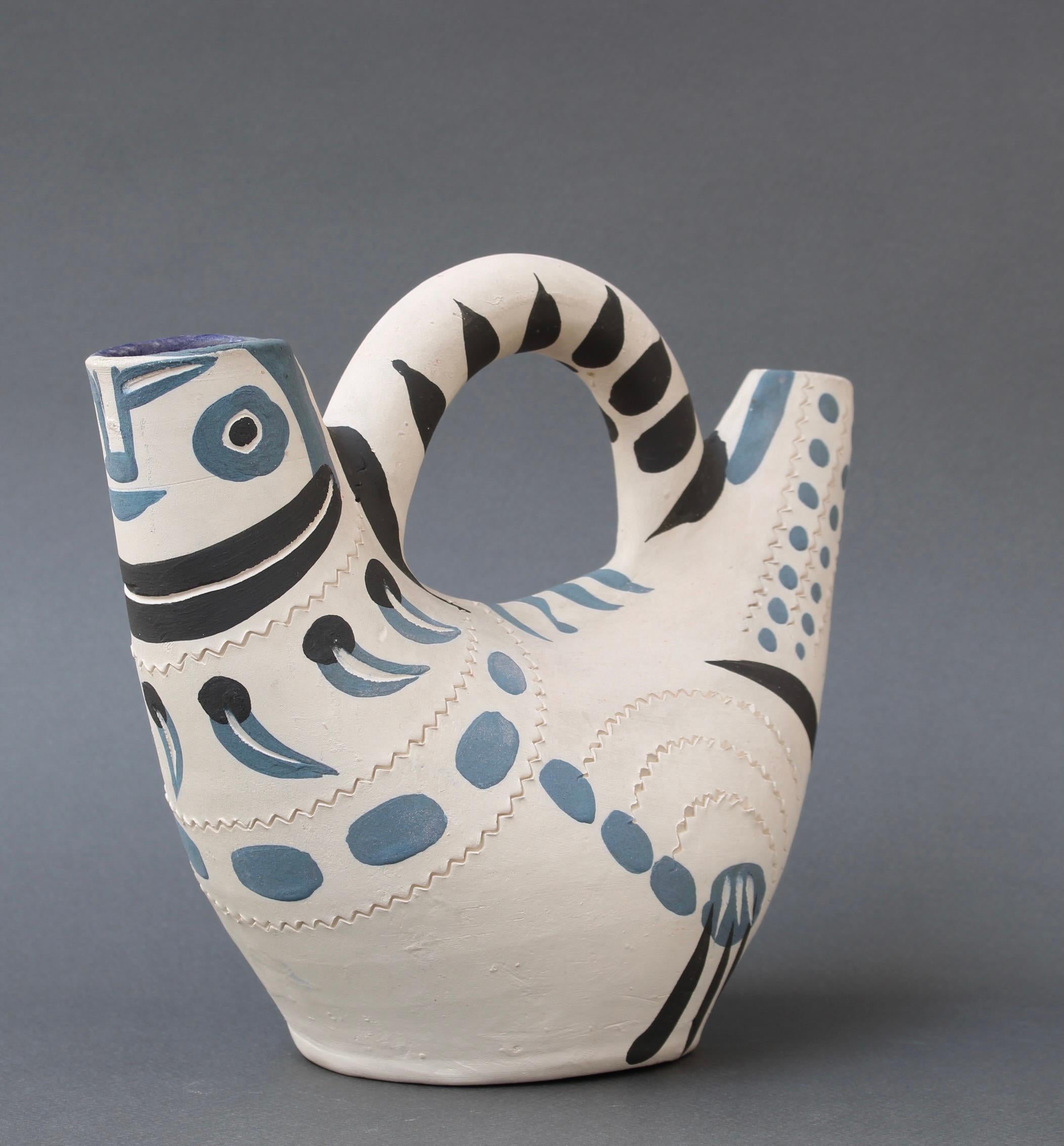 'Pichet Espagnol' ceramic piece from the Madoura Pottery (A.R. 245) by Pablo Picasso (1954). A fired, unglazed ceramic pitcher in the form of a stylised bird with elegant, Minimalist painted decor. This is a vintage, limited edition earthenware