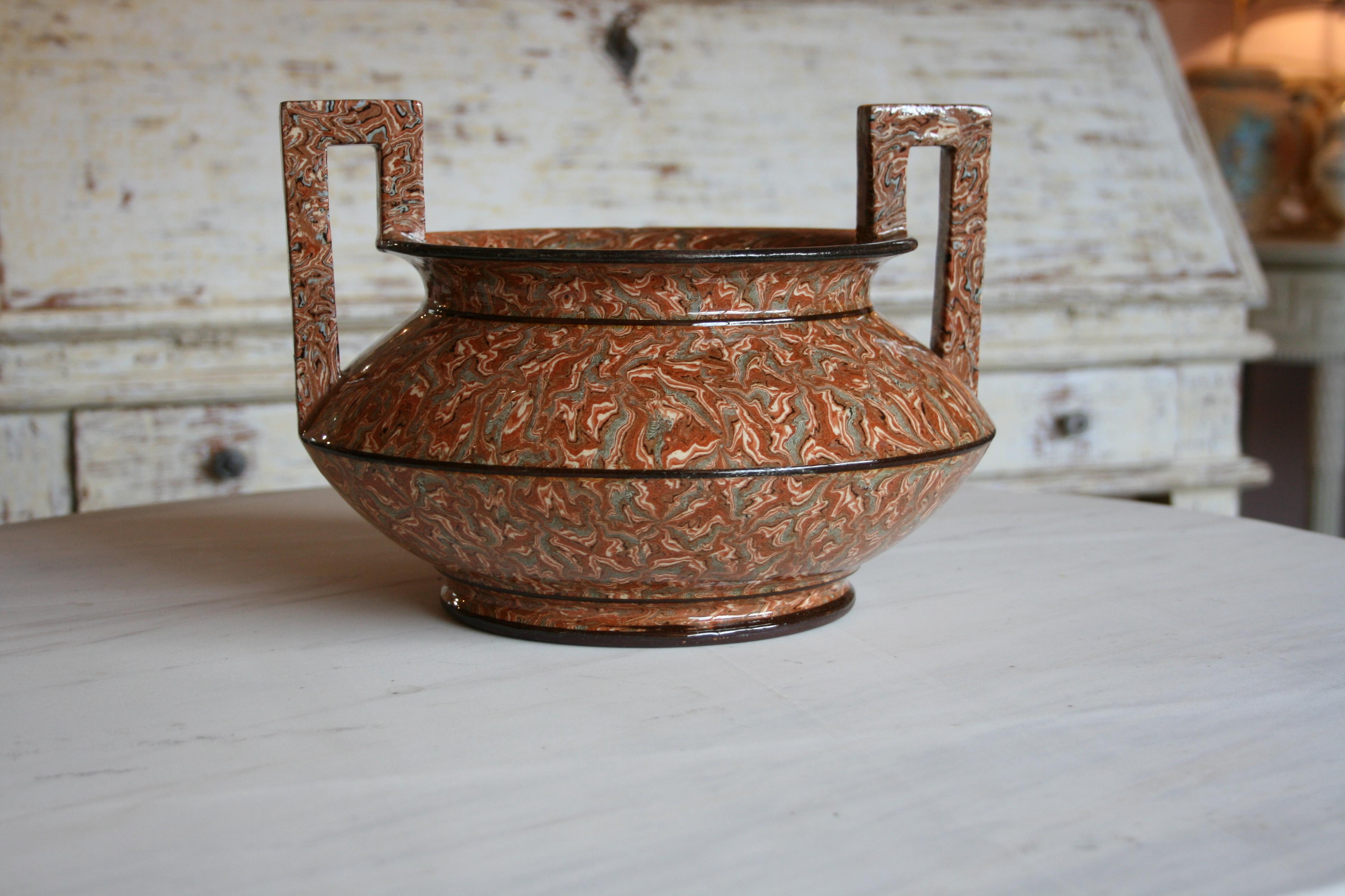 Near perfect example of Provençal agateware from the celebrated Pichon manufacturer, Uzes. Dating from circa 1880 and stamped Pichon to the underside. Wonderful shape with enameled brown, ochre and grey tones and Greek key handles.