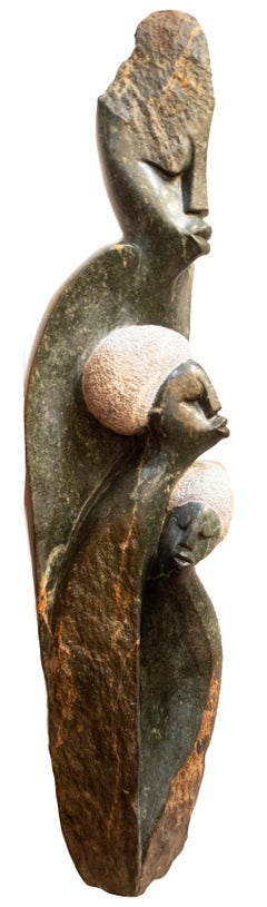 Yo y mi familia" escultura original en piedra shona de Picket Mazhindu Bumhira