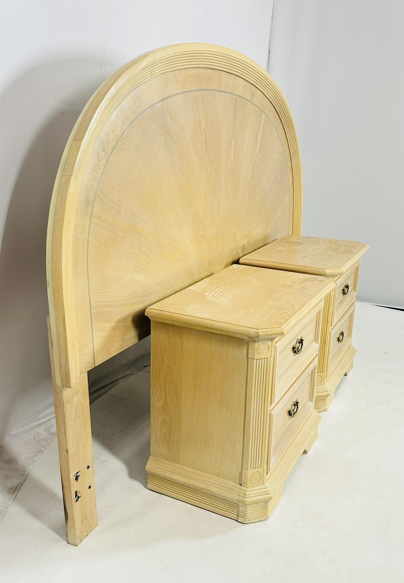 Pair of Vintage nightstands together with a matching king size headboard.

The pieces were designed and manufactured in the United States in the late 1970's or early 1980s.

The pieces are made in pickled white oak wood and brass hardware.
The