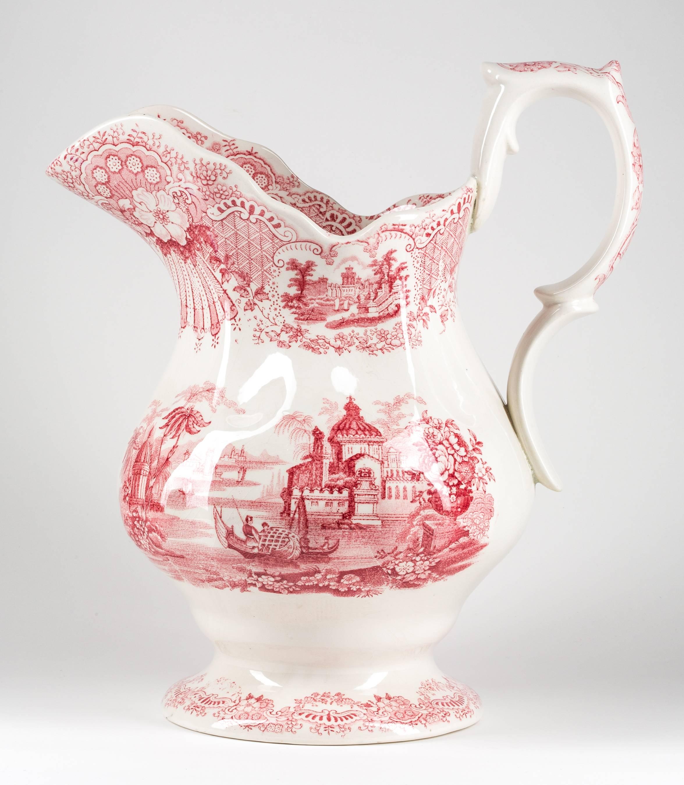 This matched set of porcelain transferware pitcher and basin are decorated in 
