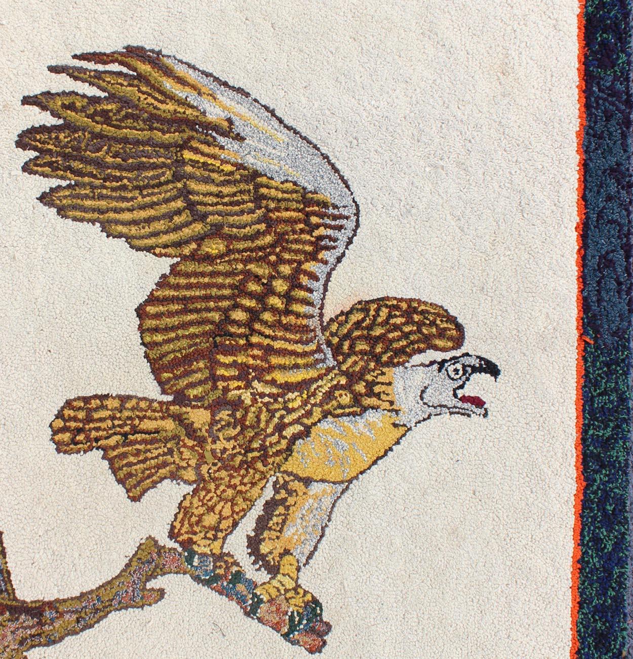Creams and Gold, tan antique American hooked rug with a bald eagle on a tree , Keivan Woven Arts / rug J10-1201, country of origin / type: United States / Hooked, circa 1950

This colorful American hooked rug depicts a American Bald Eagle before