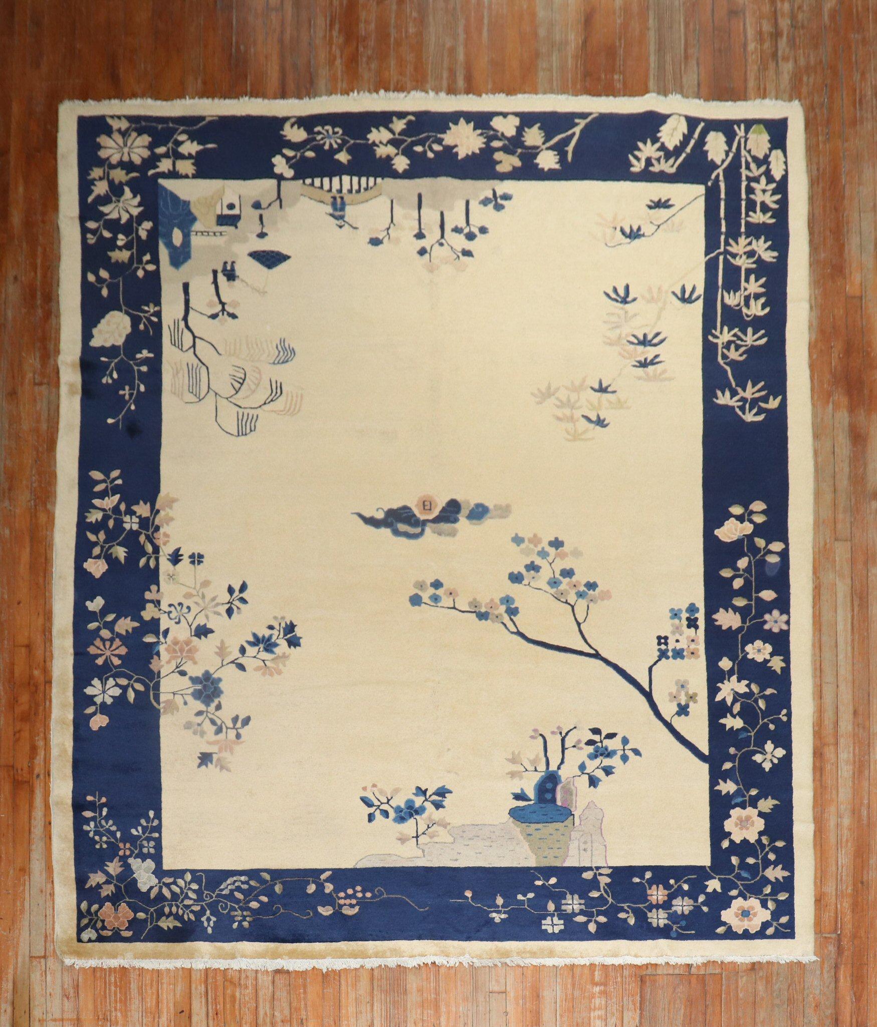 Full Pile Chinese Room size Pictorial rug from the 2nd quarter of the 20th century predominantly in beige and navy blue

Measures: 8'8'' x 11'5''.