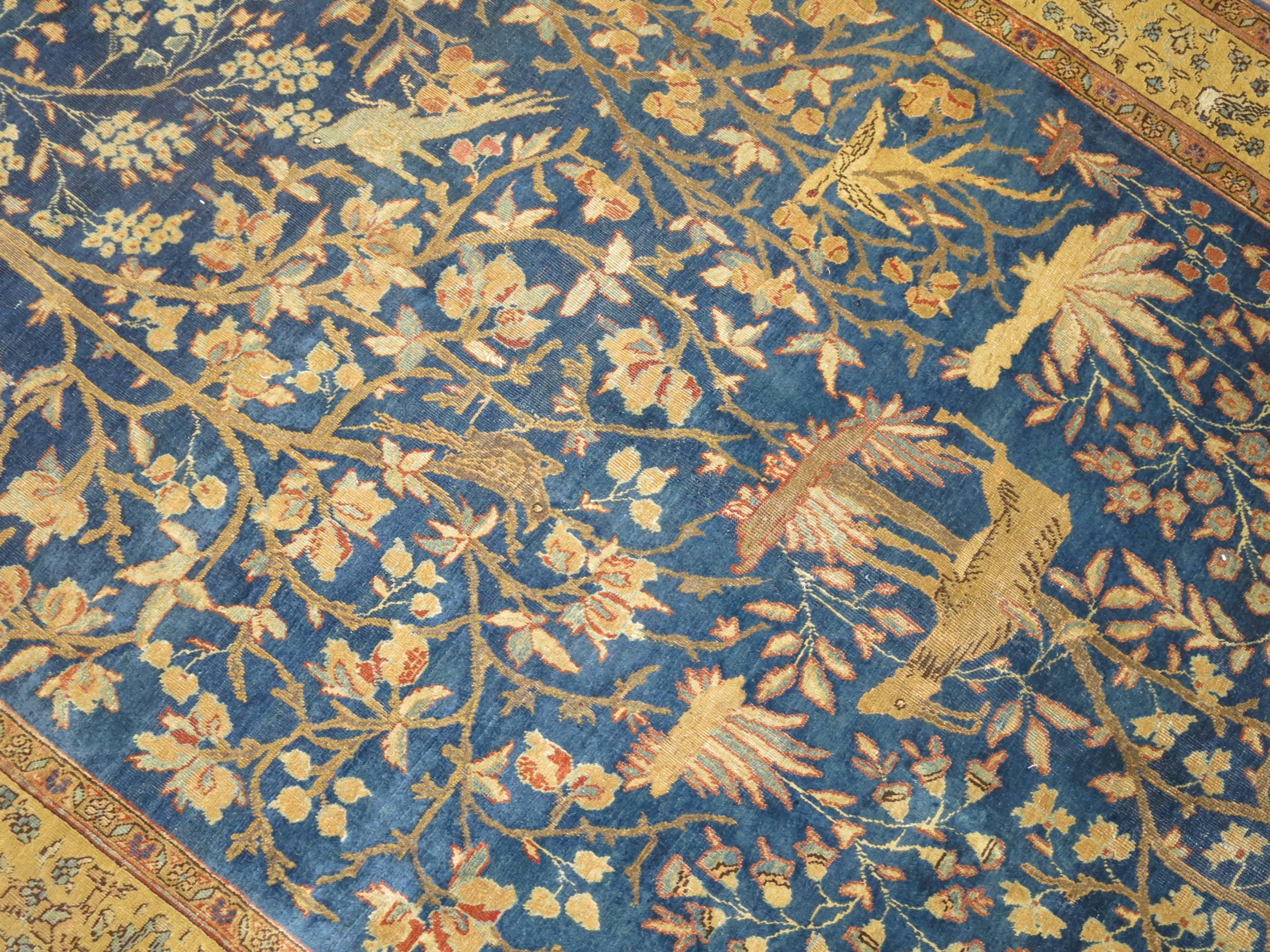 An early 20th century decorative Caliber, Persian Tabriz previously owned by a private collector in warm colors.