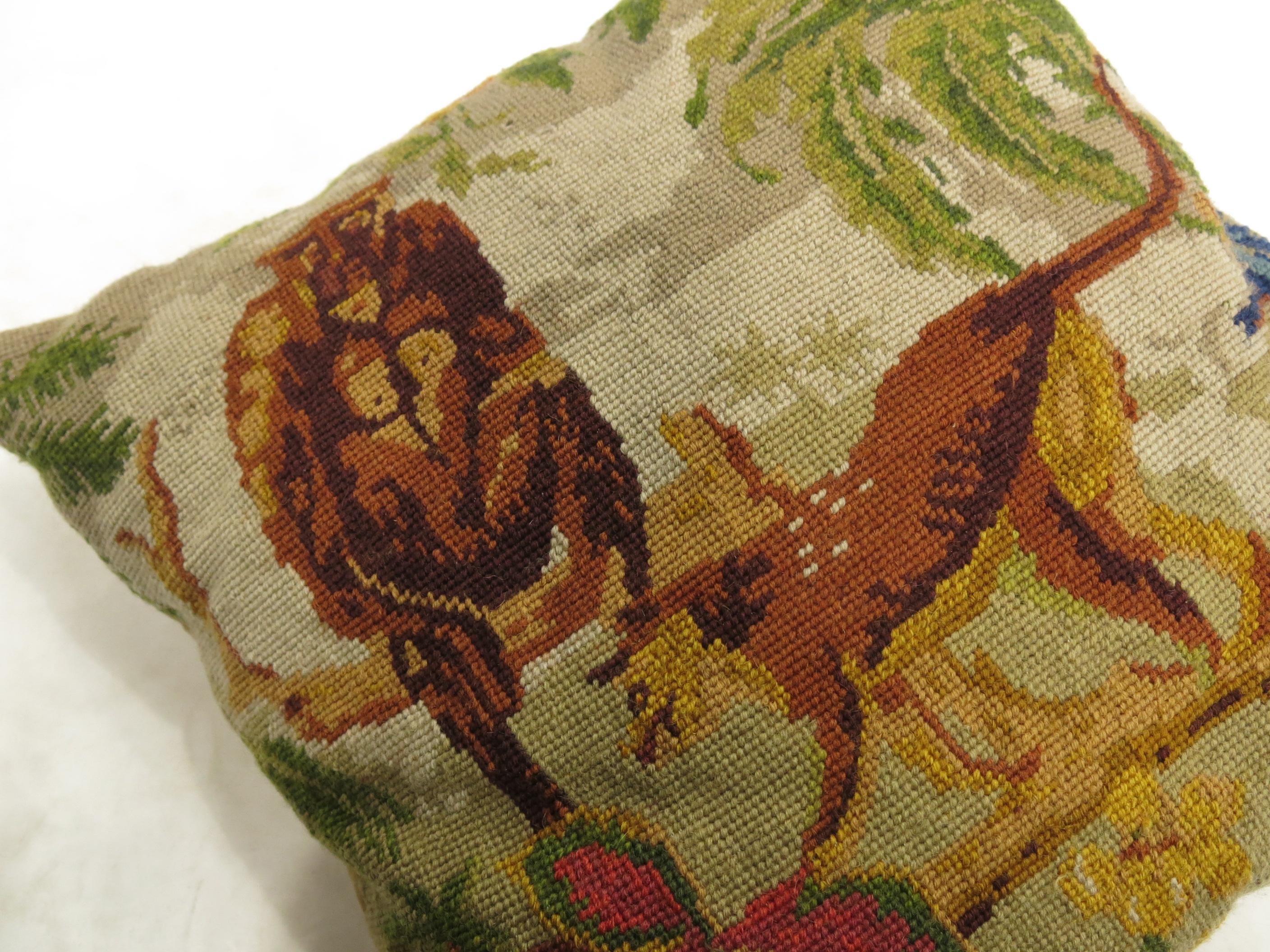 Pillow made from a 20th century Portuguese needlepoint. What looks to be a wolf and a guerrilla on a scenic background surrounded by a palm tree and nice flowers.
Purchased from an upper east condominium in Manhattan

Measures: 16