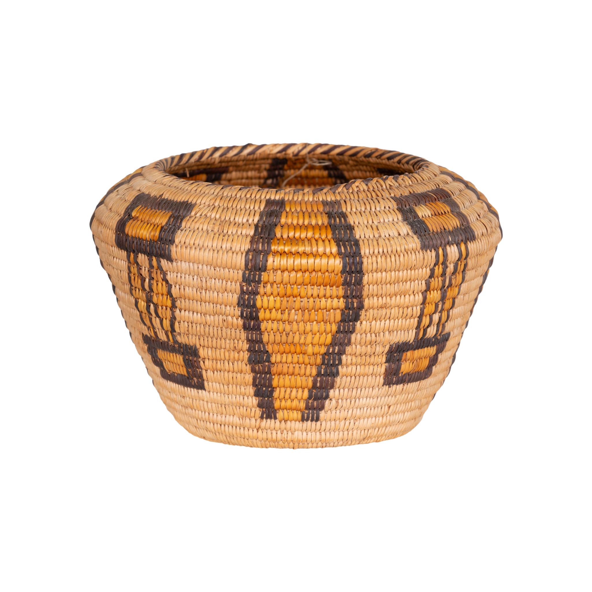 Polychrome pictorial Panamint basket with stylized butterflies, very finely woven.

Period: Last quarter 19th century

Origin: Panamint

Size: 4